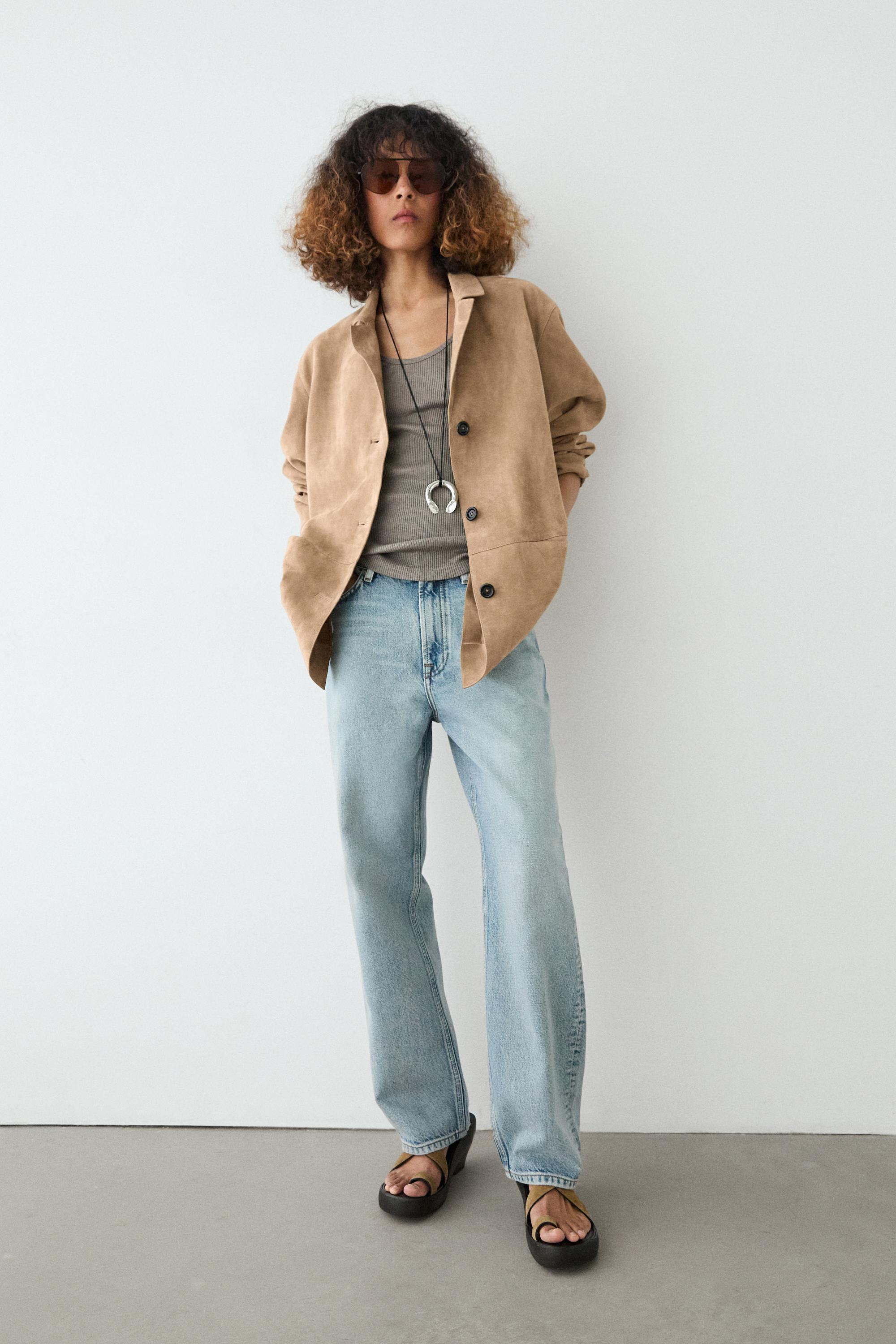 %100 ante larruzko jaka, poltsikoen xehetasunarekin