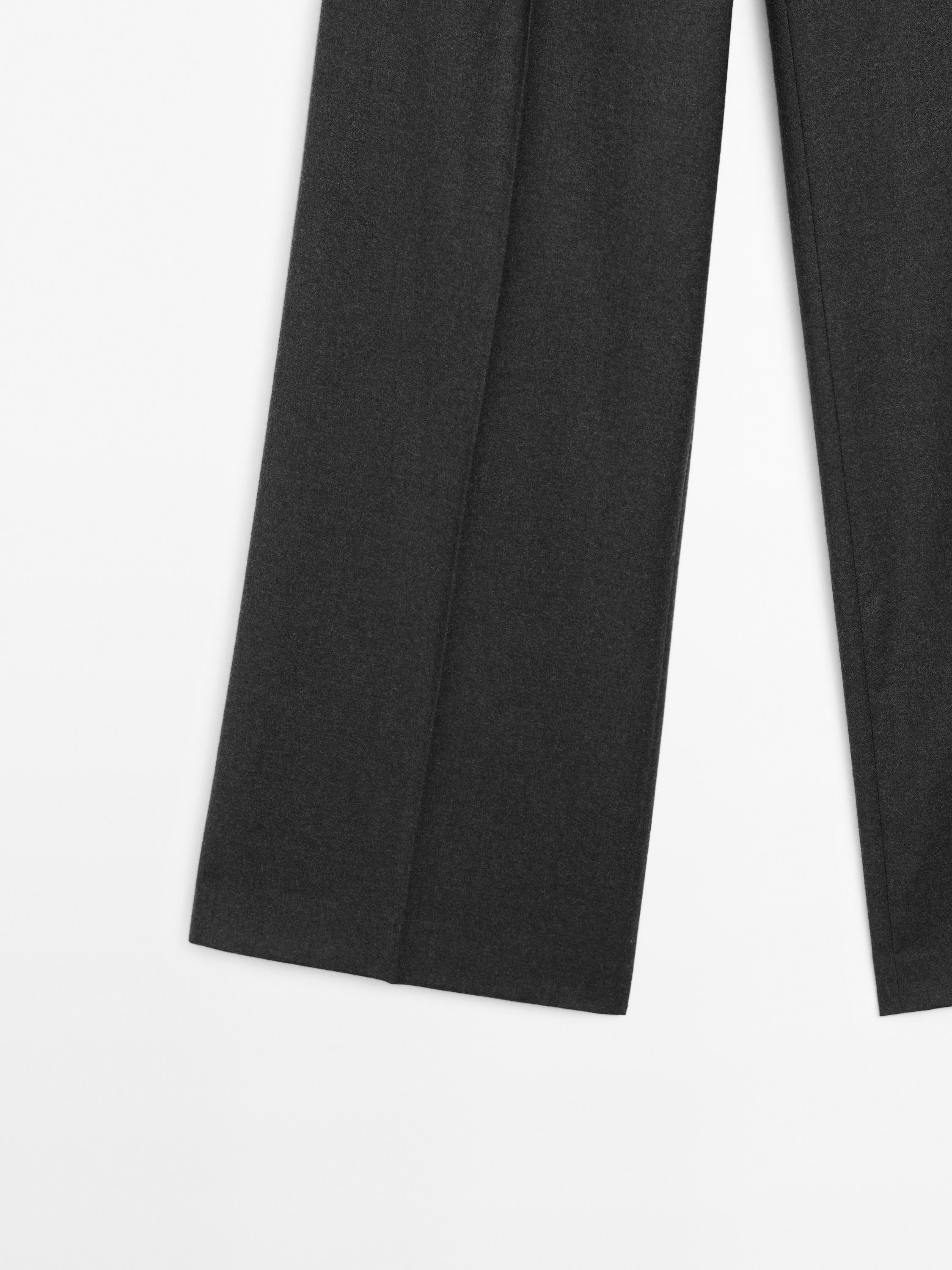 Flannel trousers with elastic detail