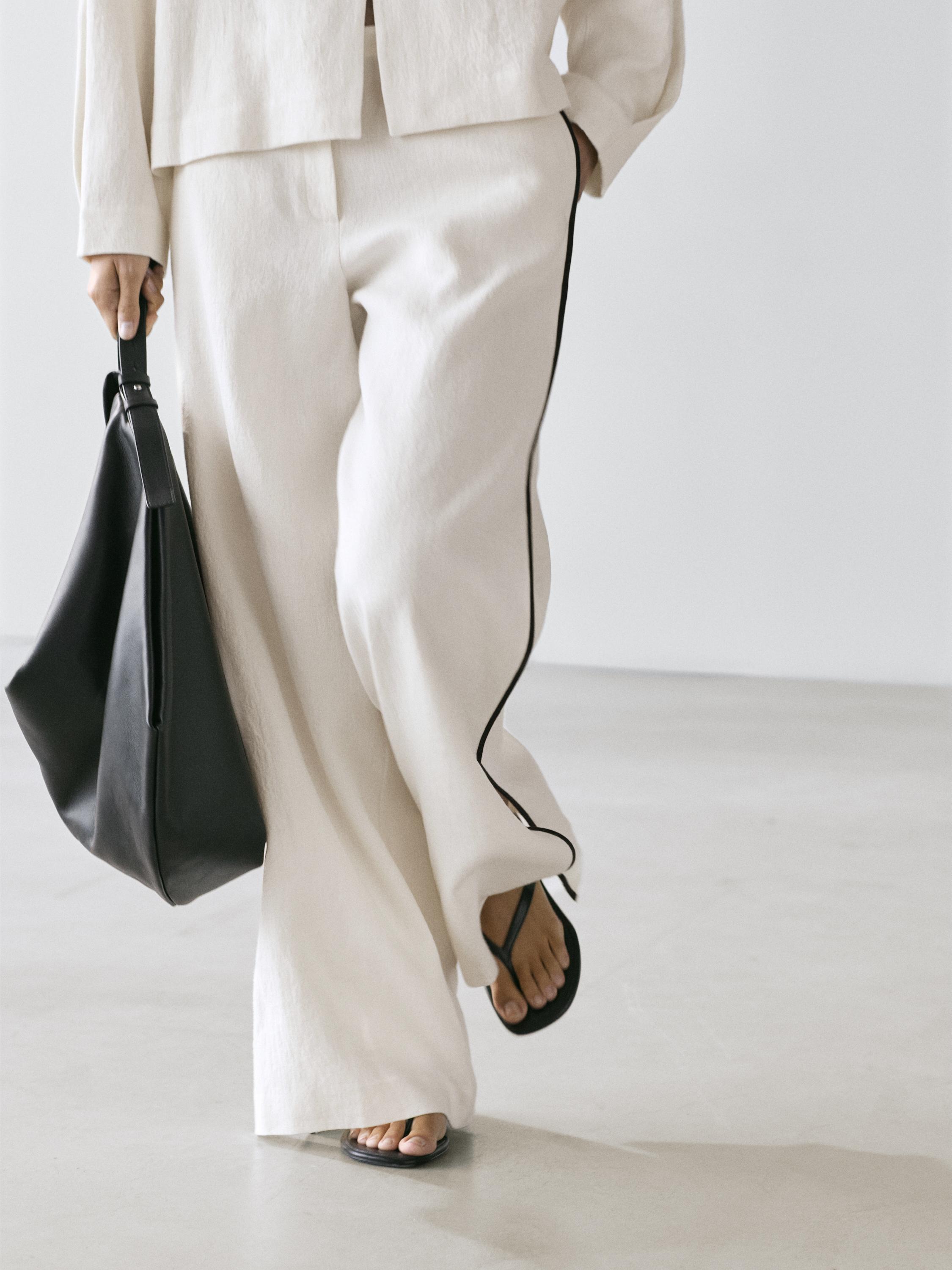 Linen trousers with contrast piping — CREAM