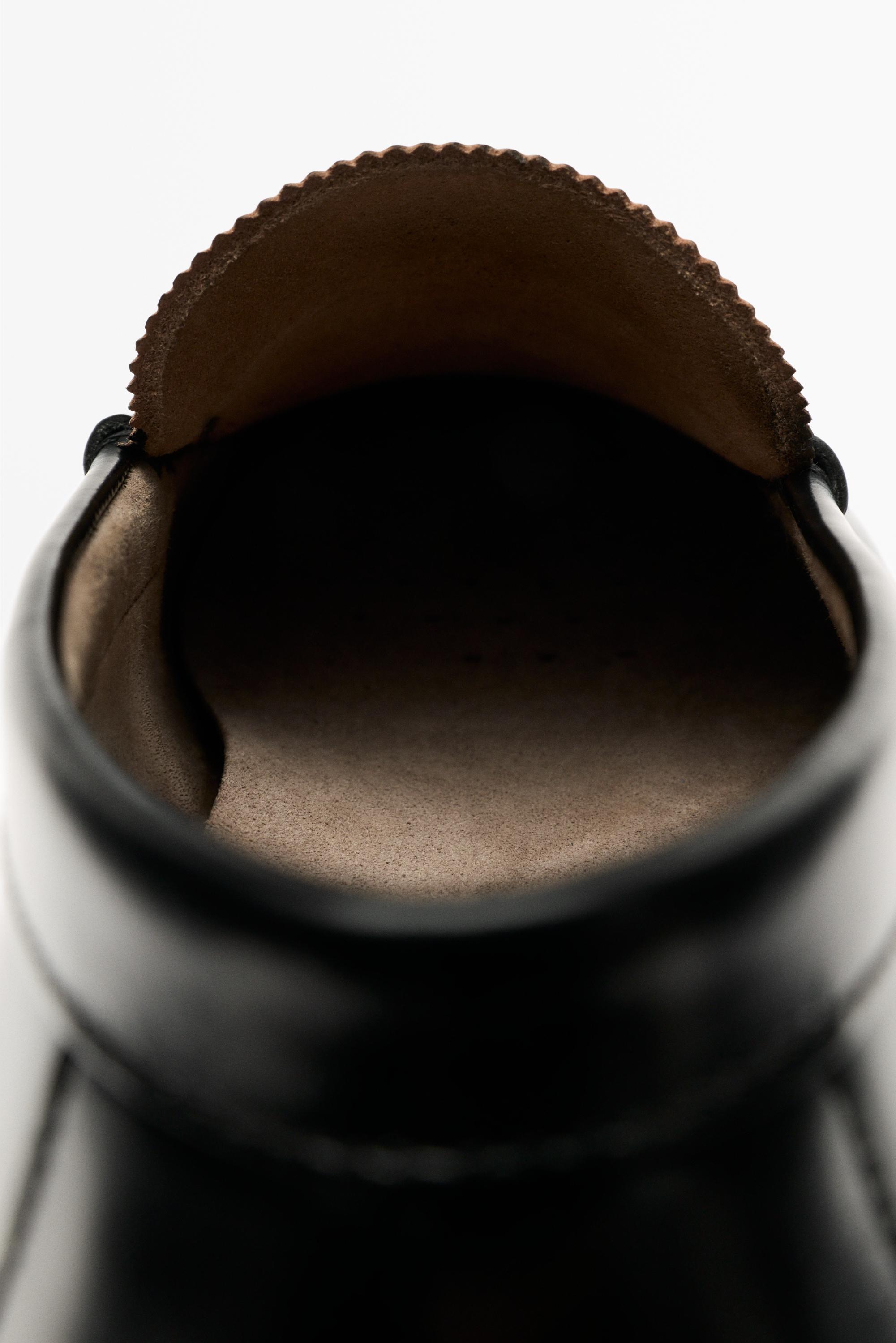 Leather penny loafer — BLACK