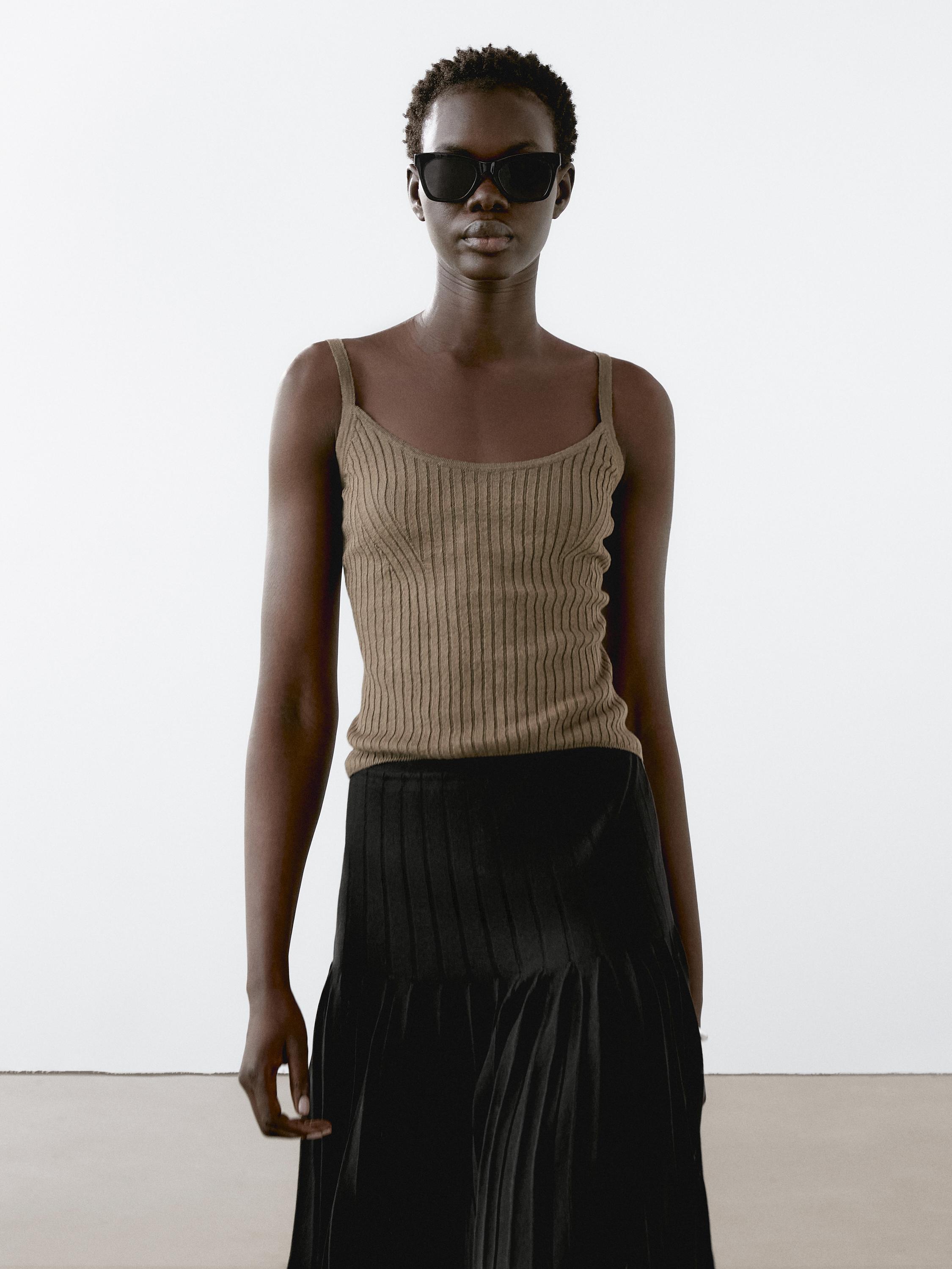 Top punto tirantes detalle rib