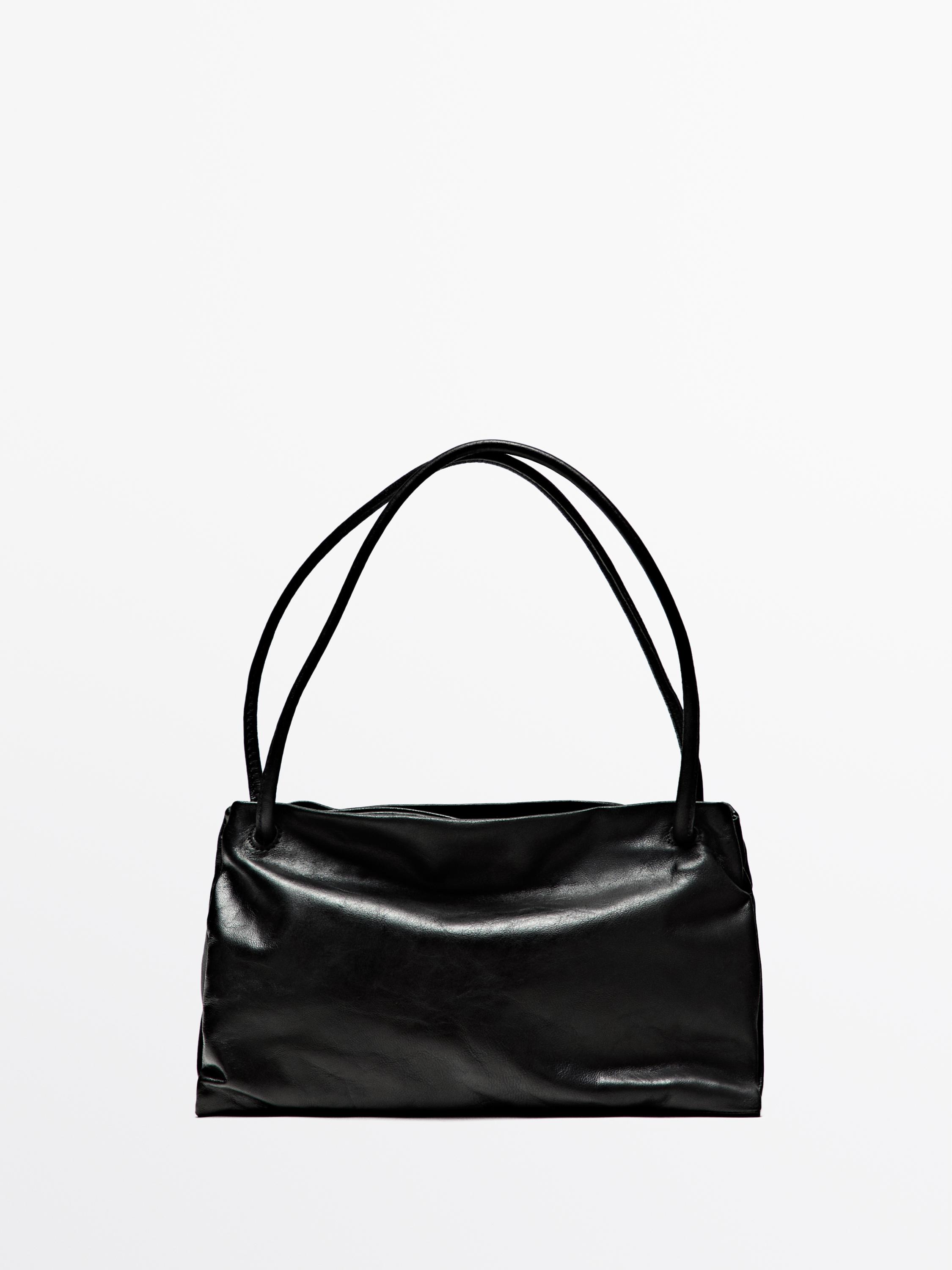 Small nappa leather bag with compartments