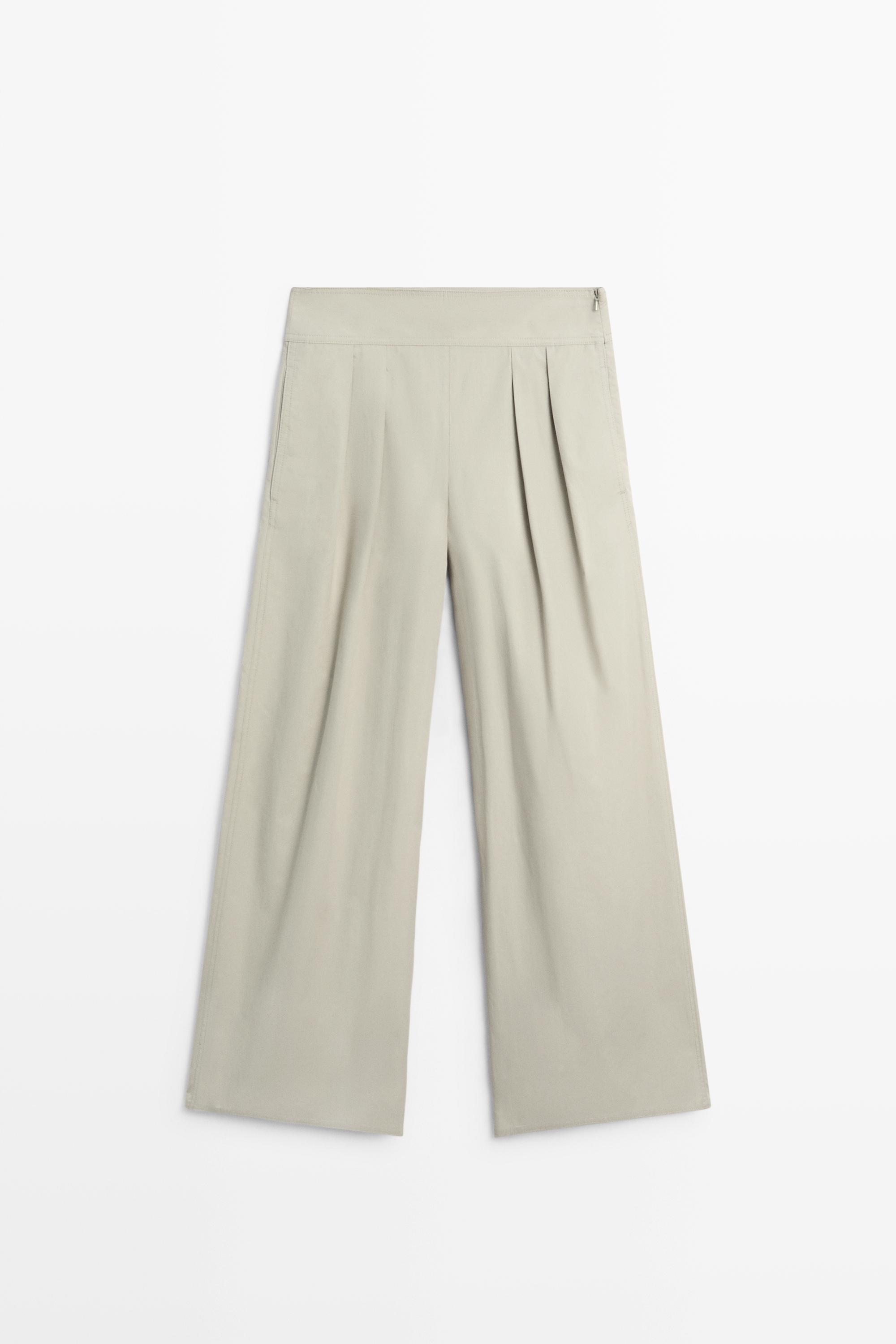Pantalon large plissé avec ceinture