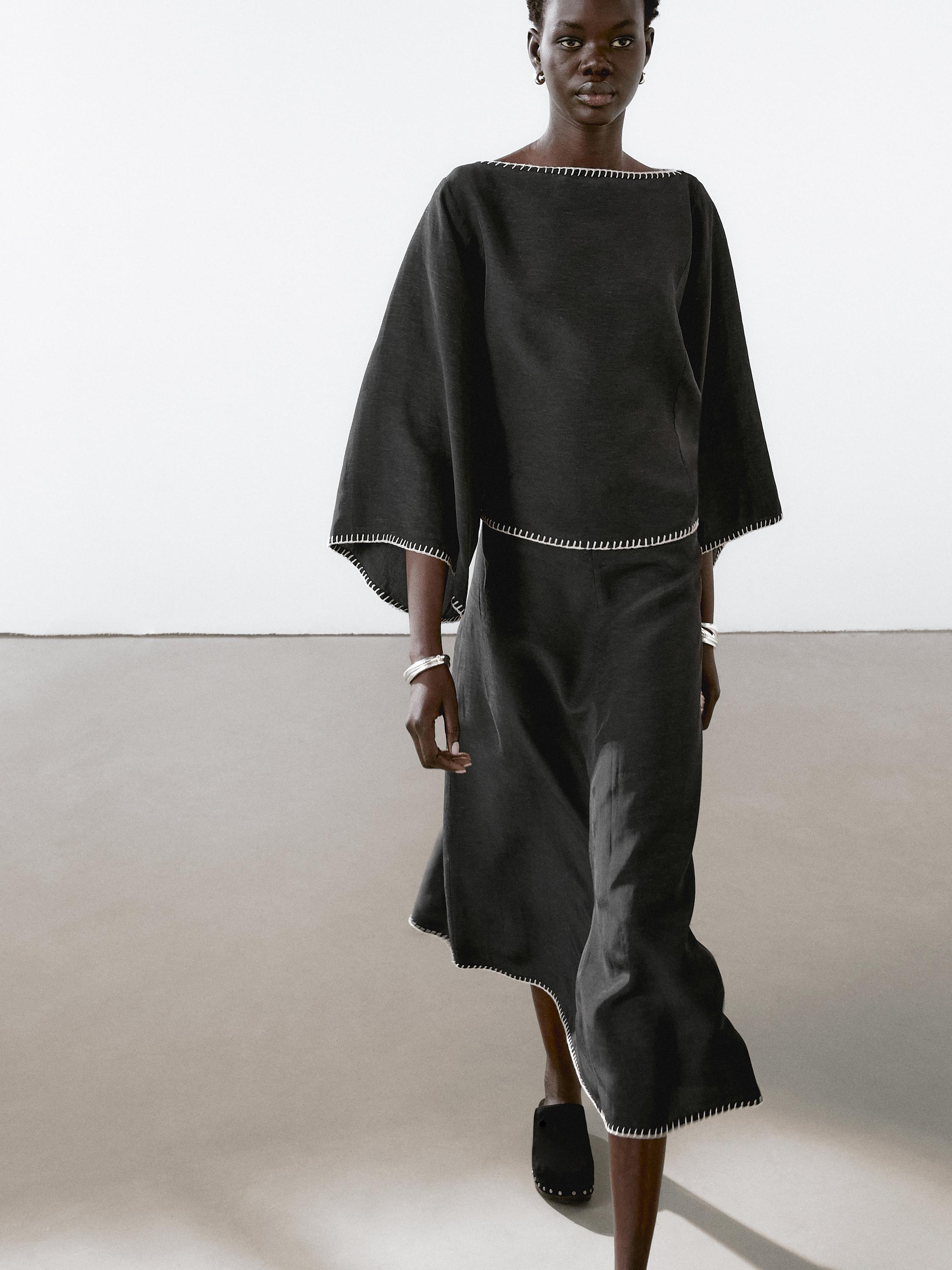 Chemisier cape à manches chauve-souris