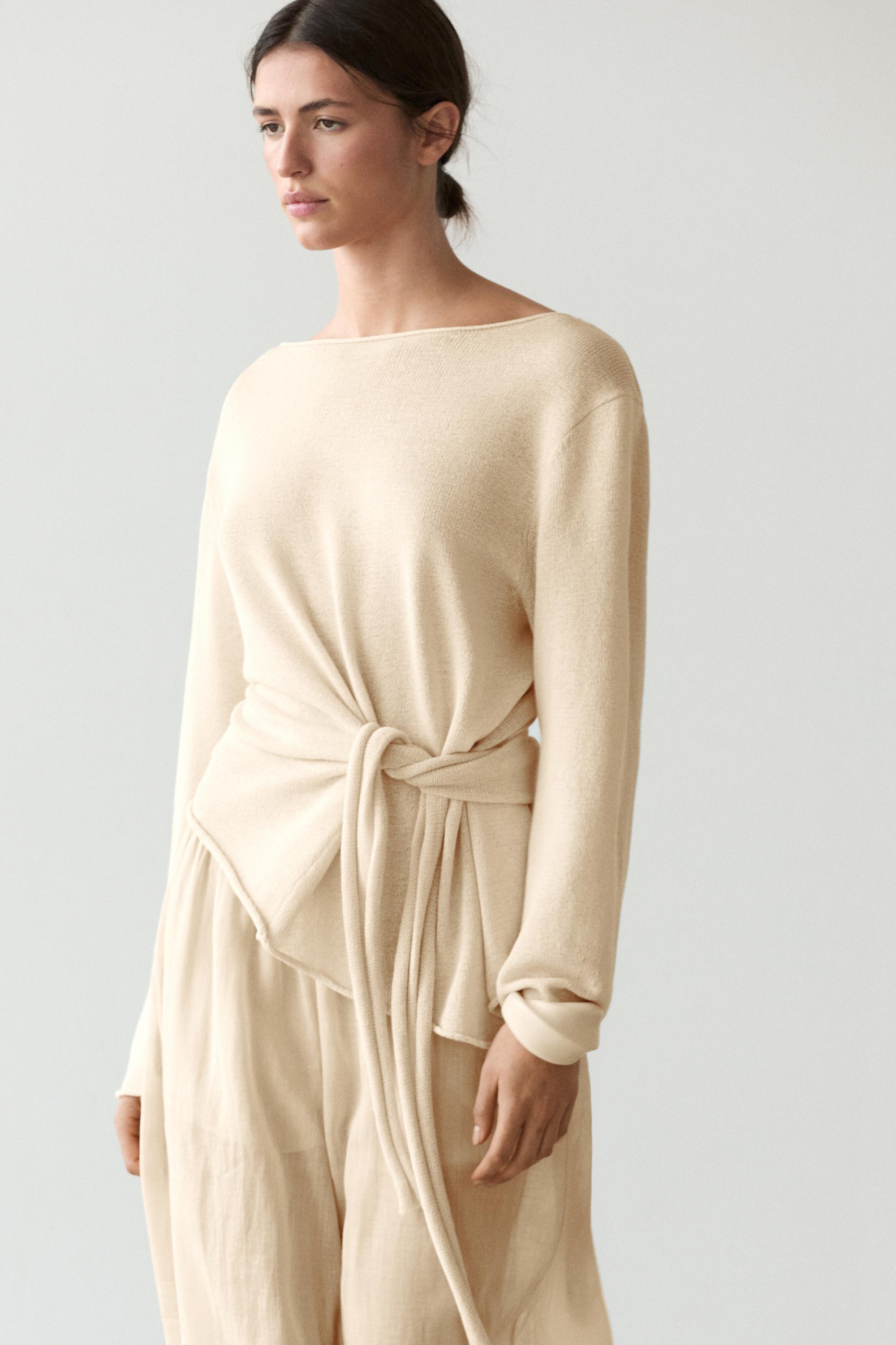 Sweter campuran linen asimetris dengan detail tali