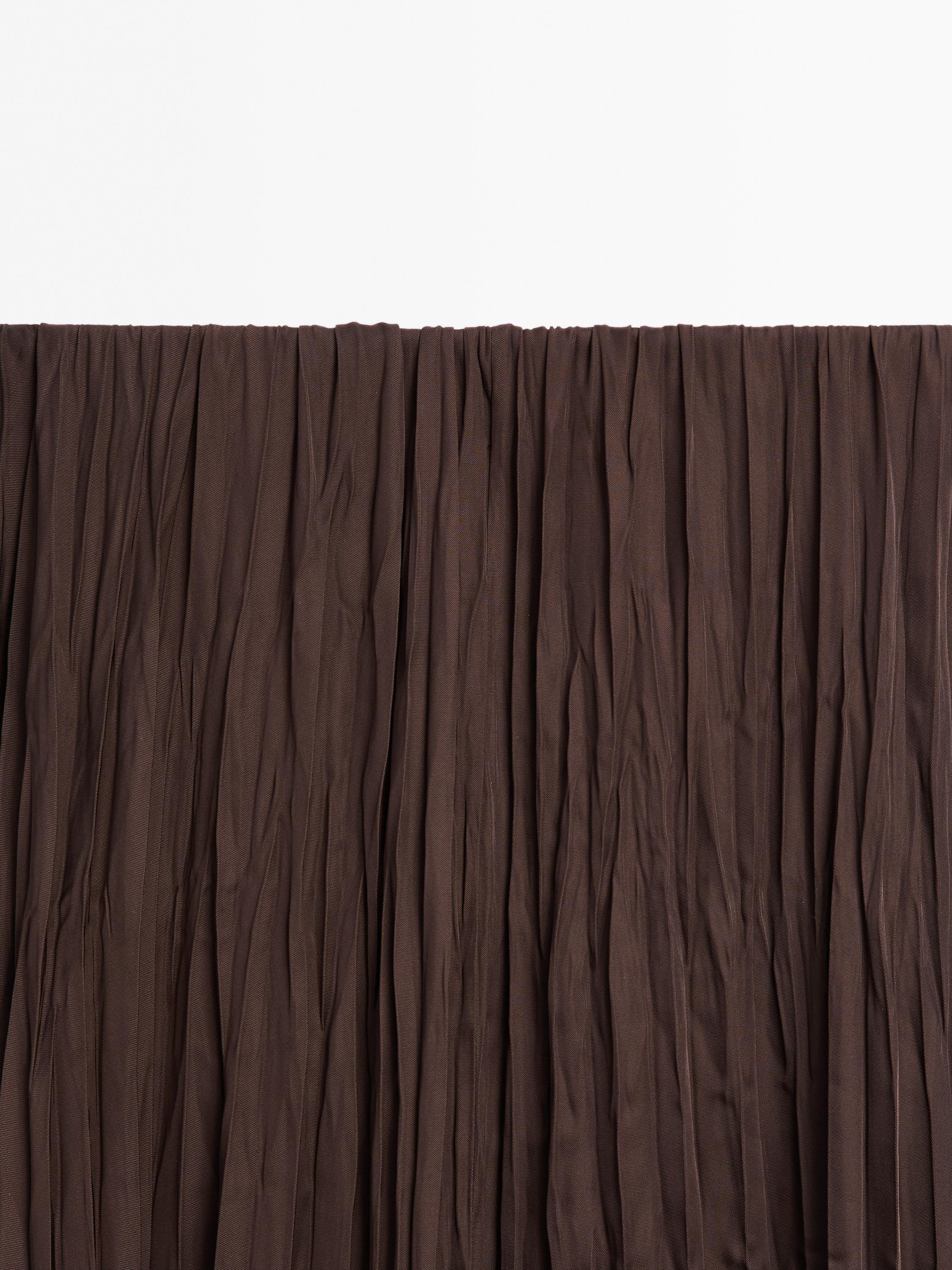 Long flowing pleated skirt