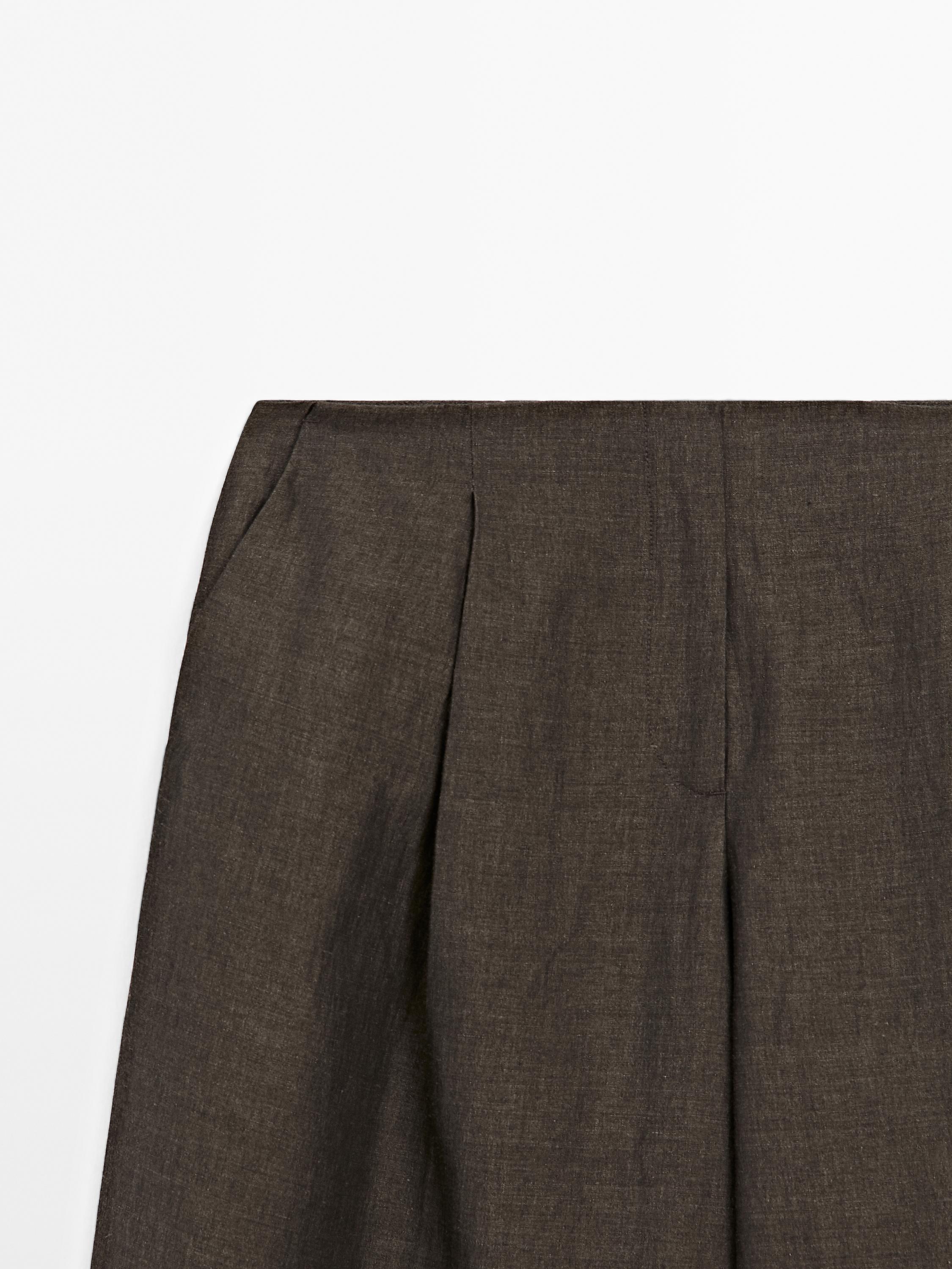 Flowing linen blend trousers with pleats