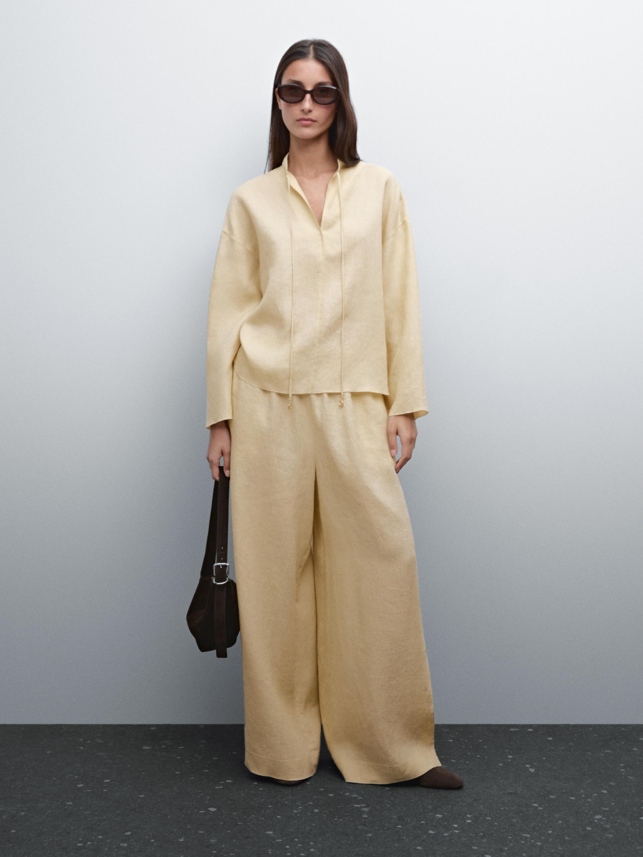 Flowing 100% linen trousers with elastic detail