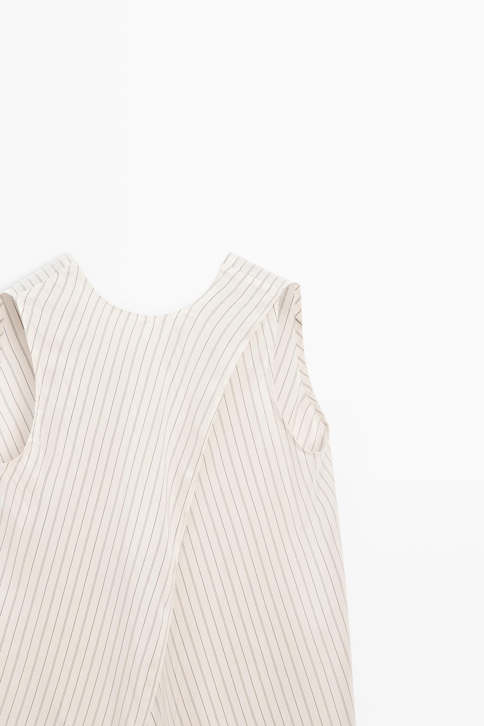 STUDIO flowing striped wrap top