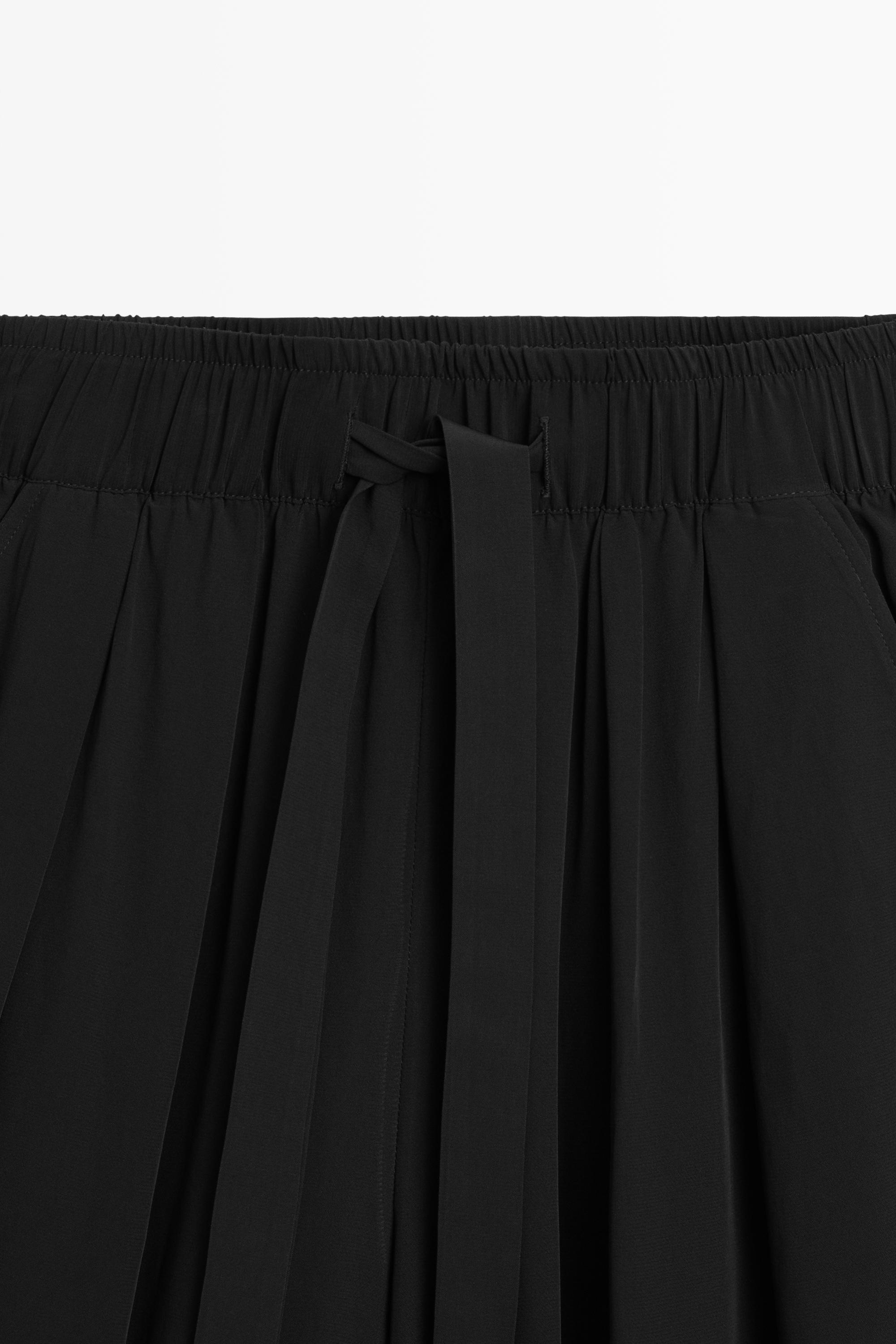 Flowing pants with tie-waist — BLACK