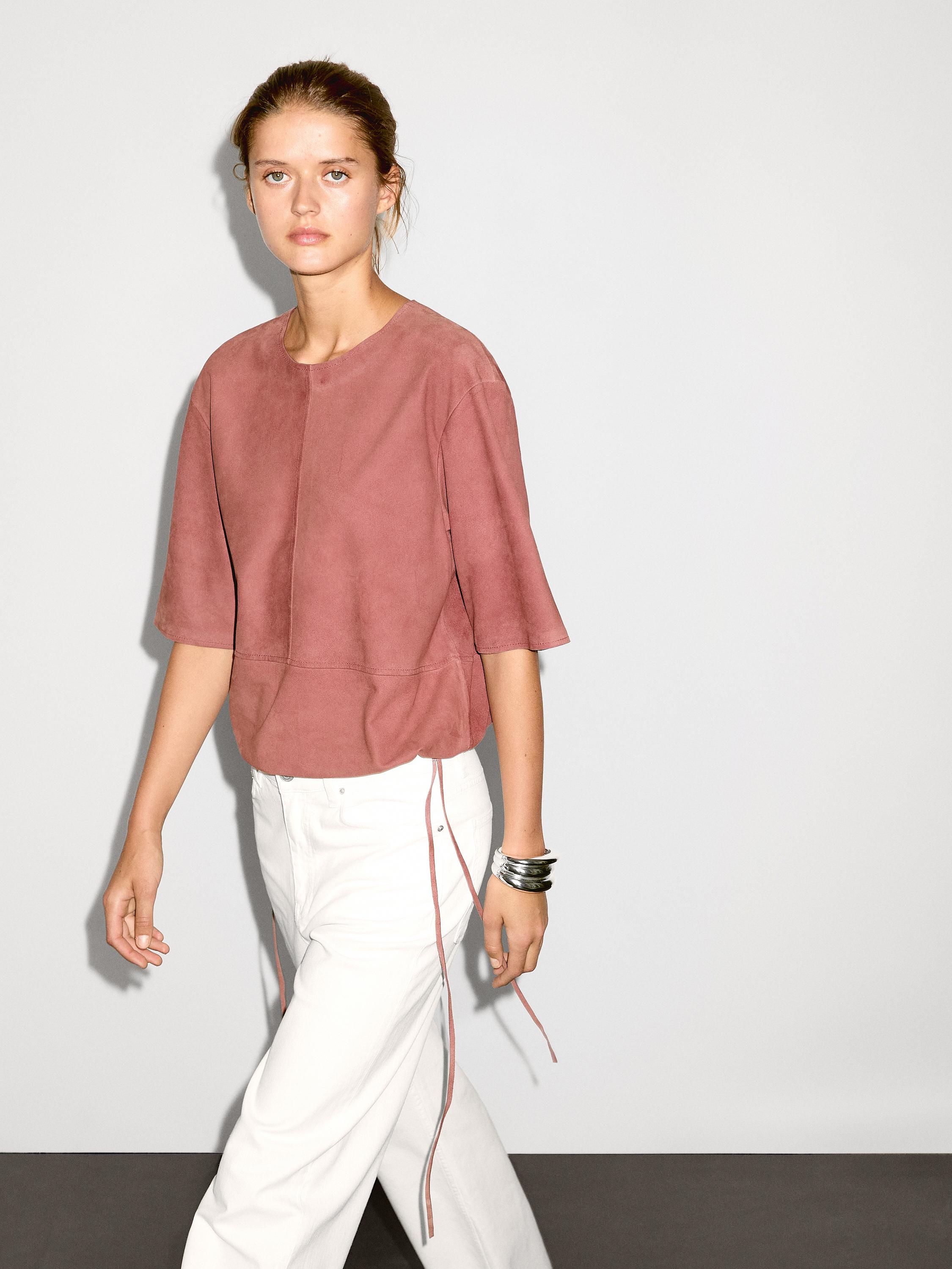 Suede leather top with strap detail