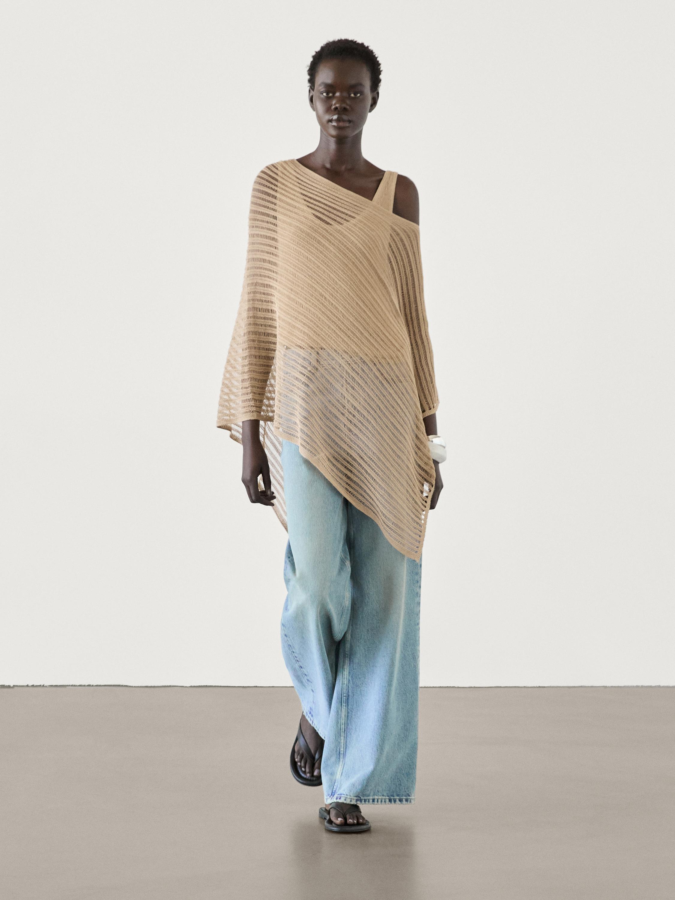 Haut cape asymétrique en maille semi-transparent