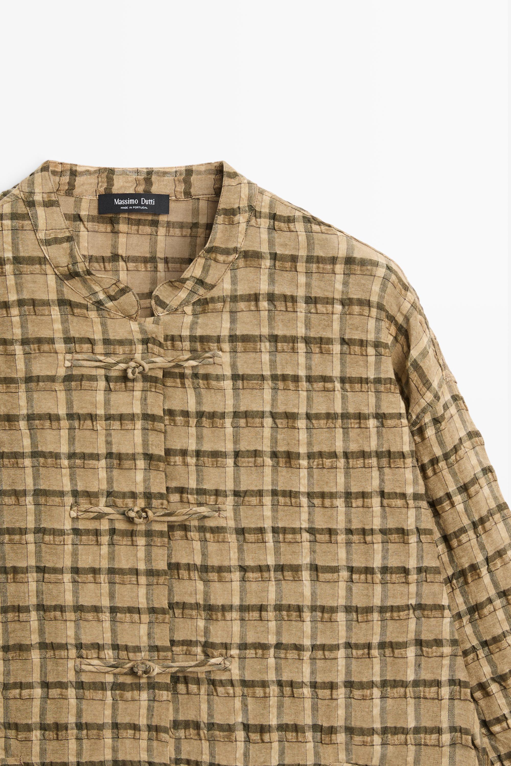 Camisa fluida detalle cuadros
