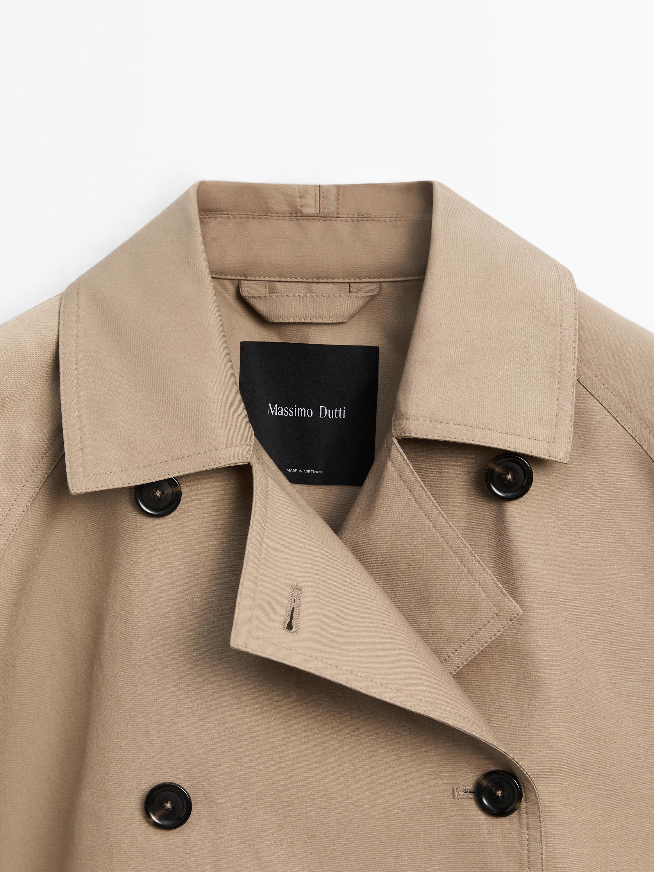 Short water-repellent cape trench coat