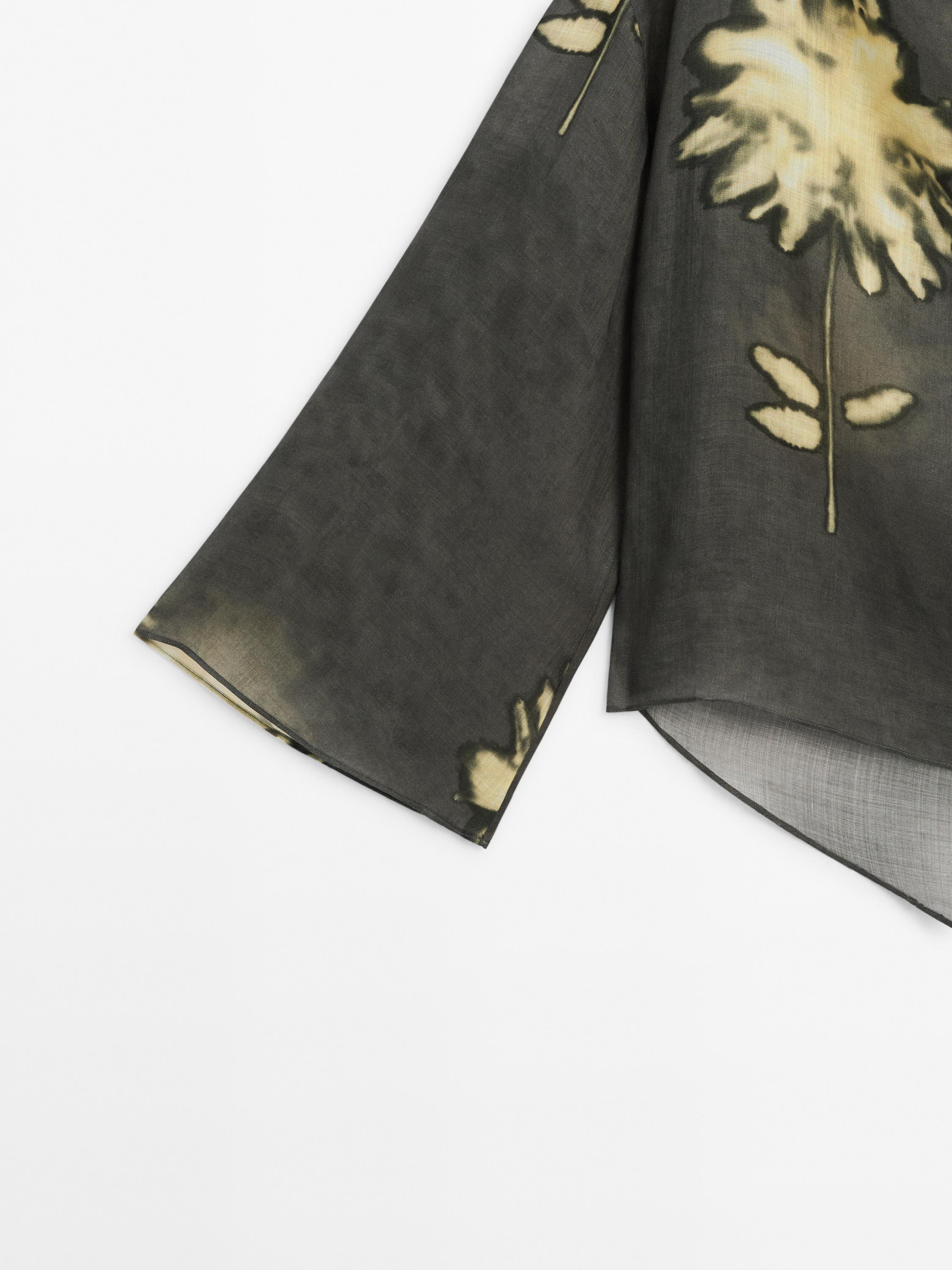 Long sleeve top with drawstring detail