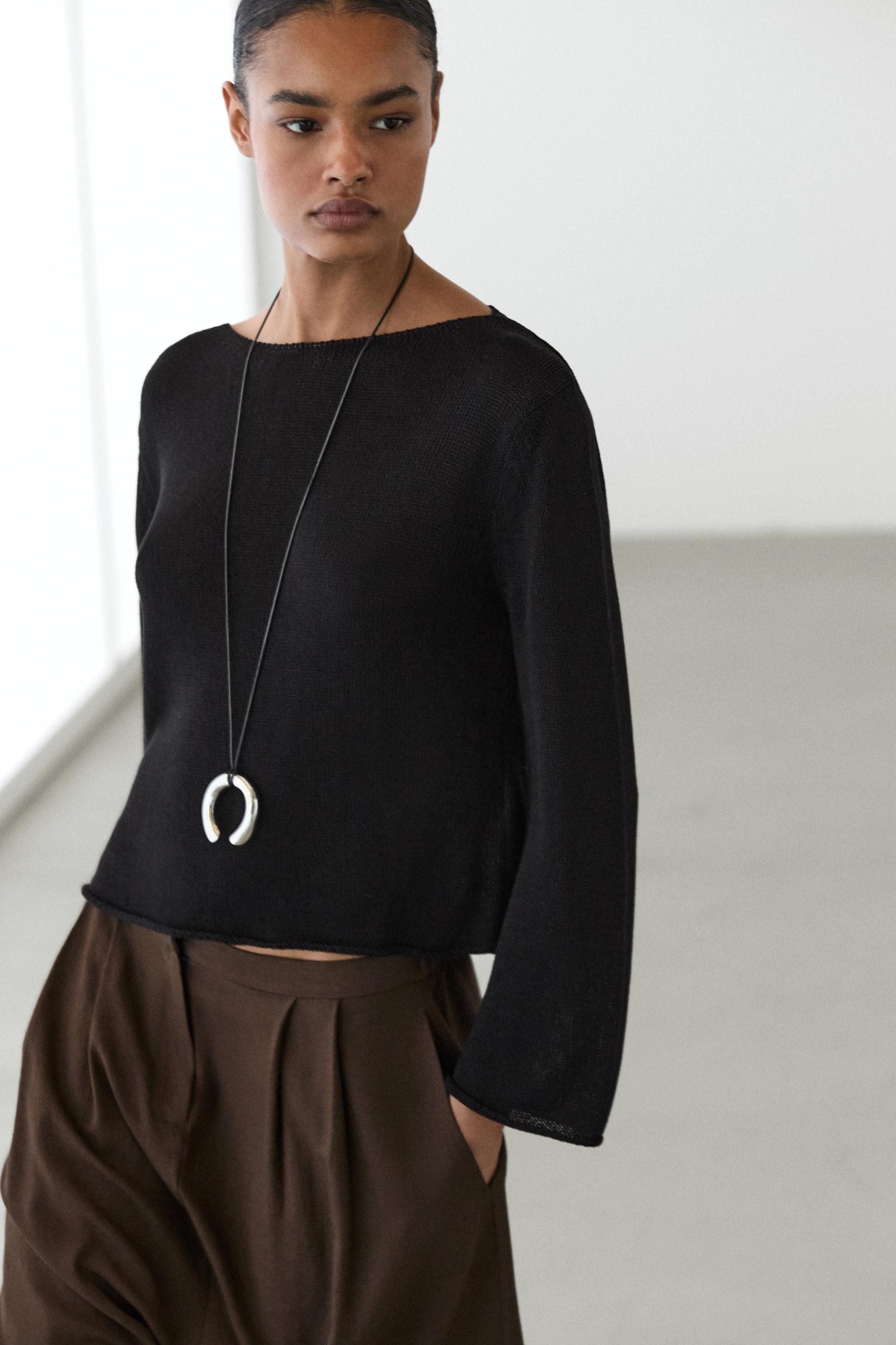 Flowing knit boat neck sweater