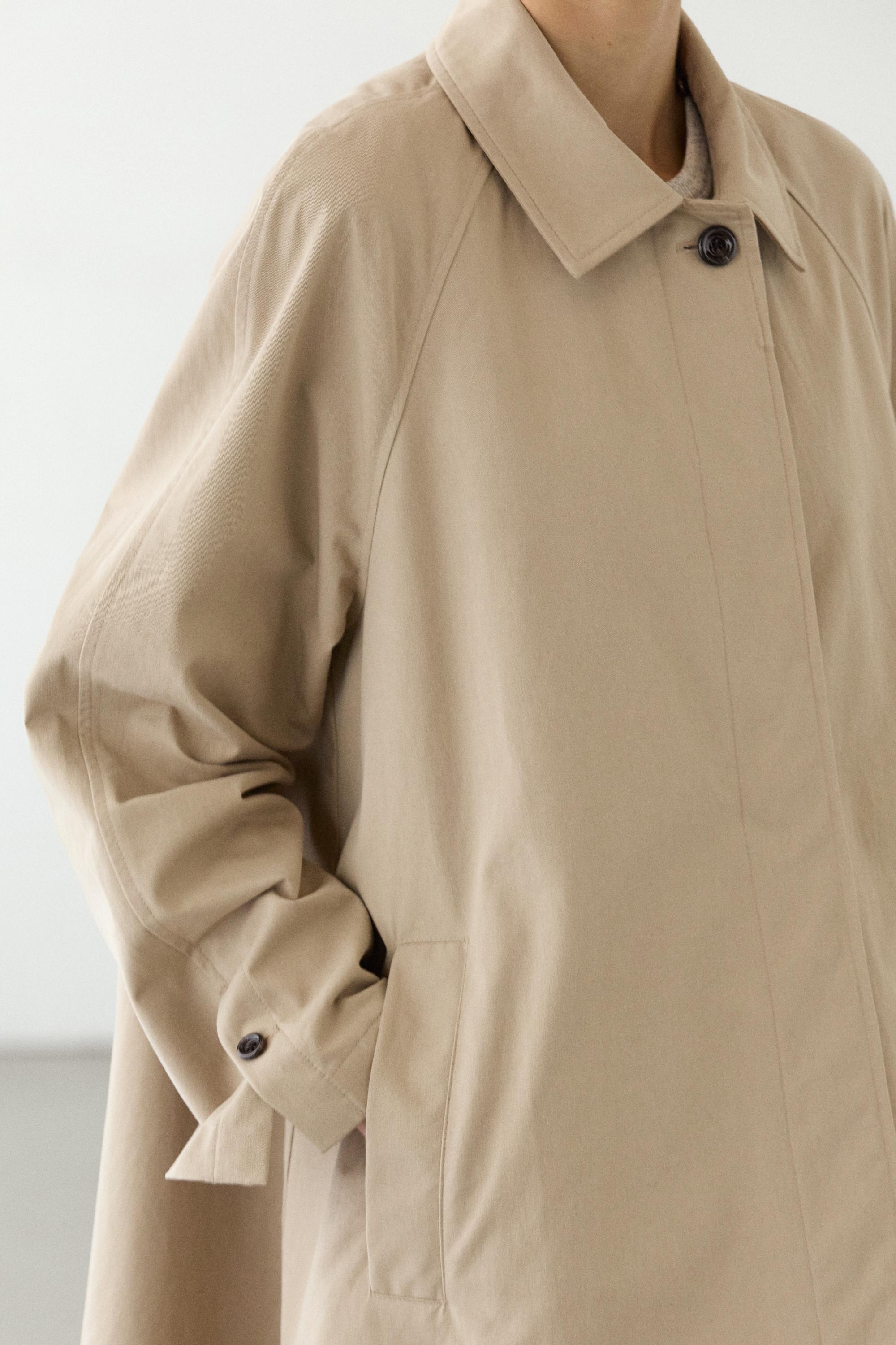 Trencha capa capucha extraíble