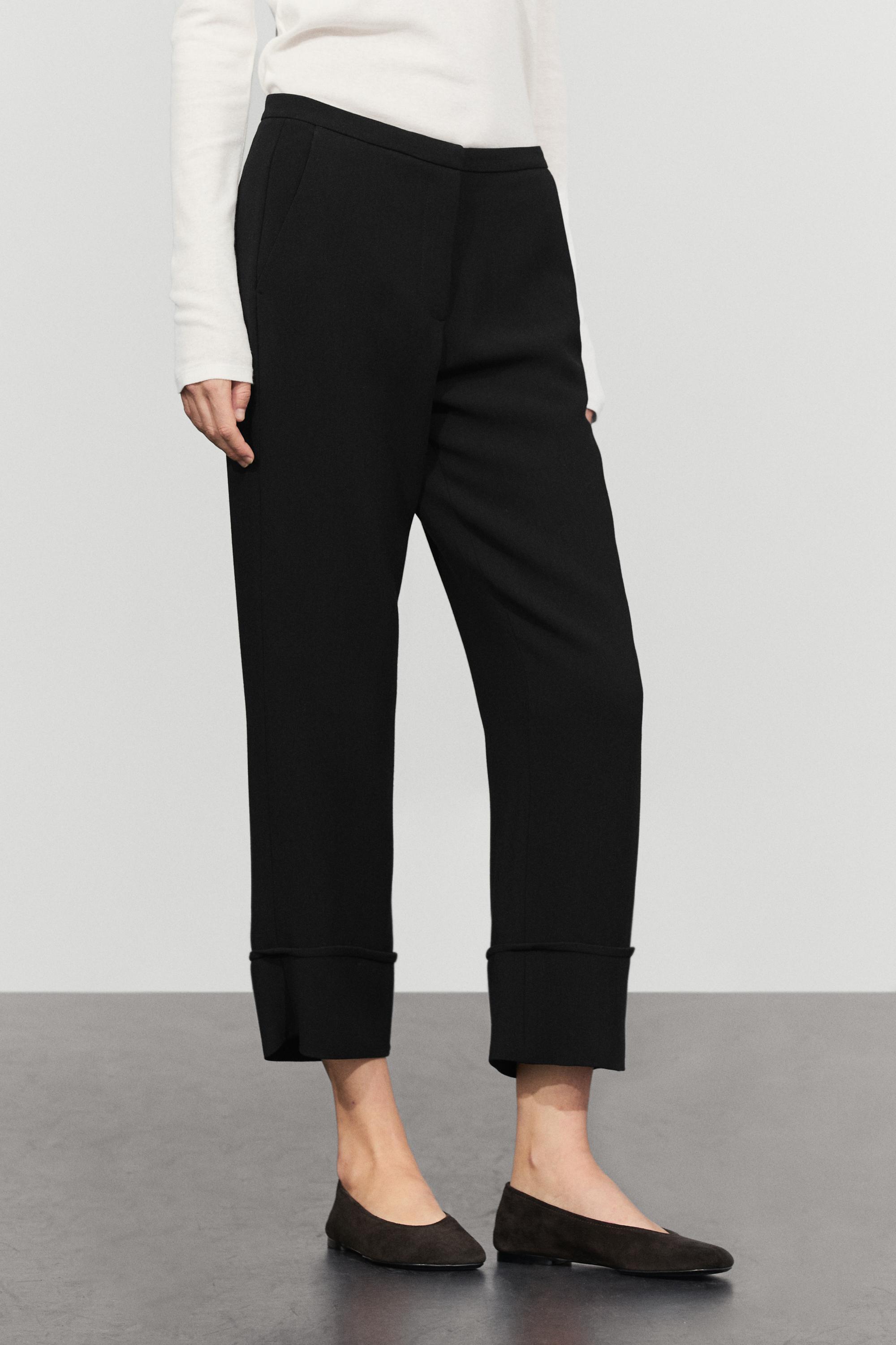 Pantalón capri detalle vuelta