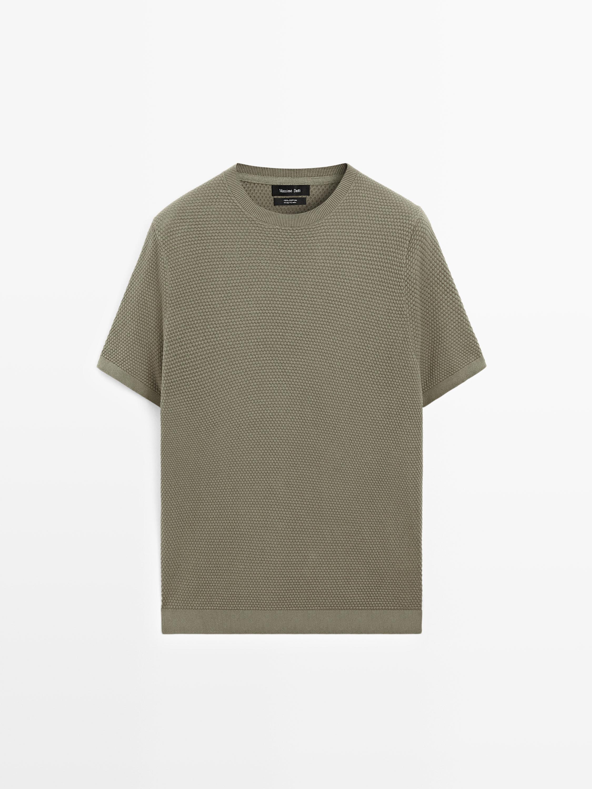 Front view of structured knit T-shirt in khaki, with a round neck and short sleeves.