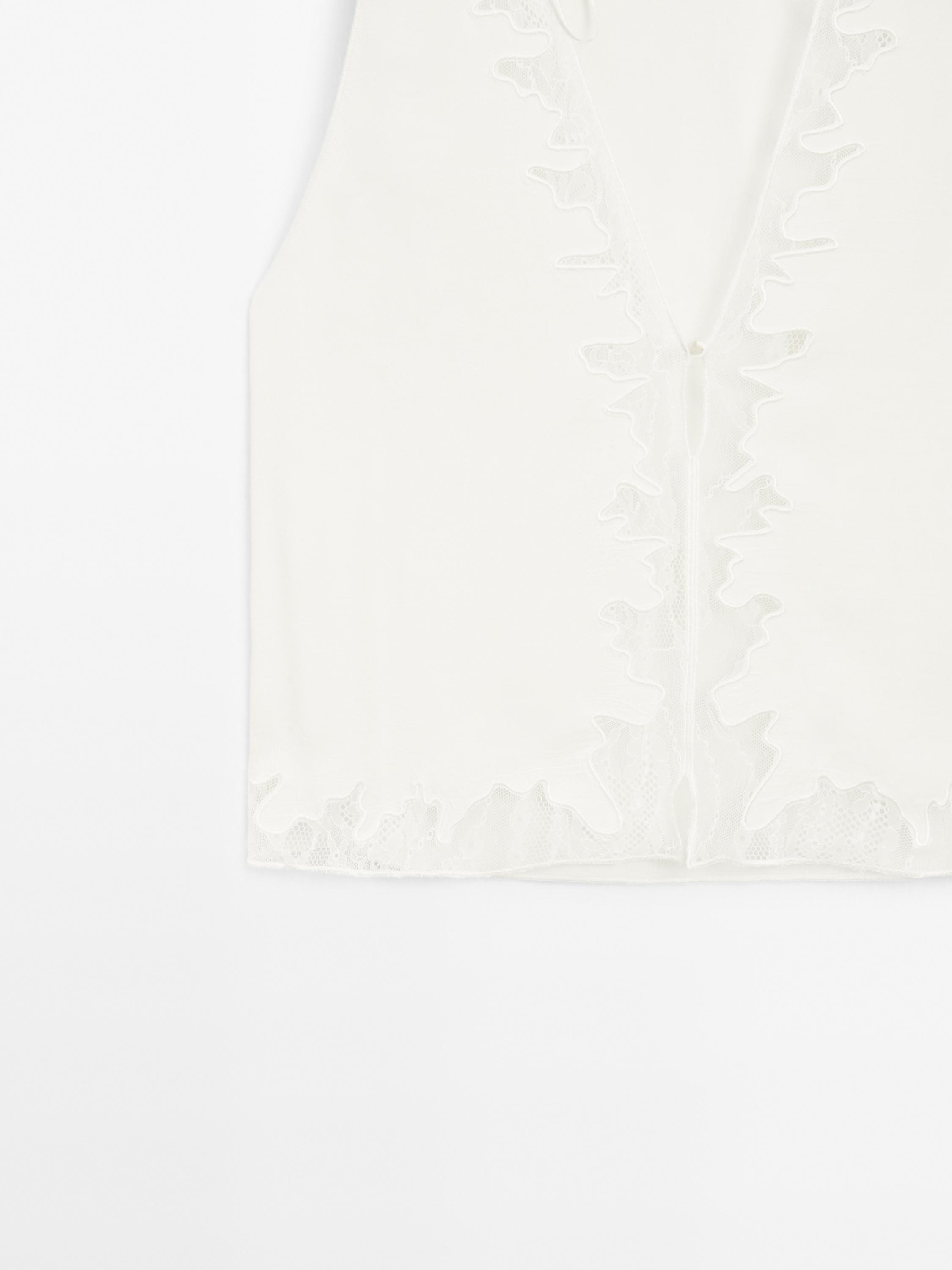 Flowing blouse with lace detail