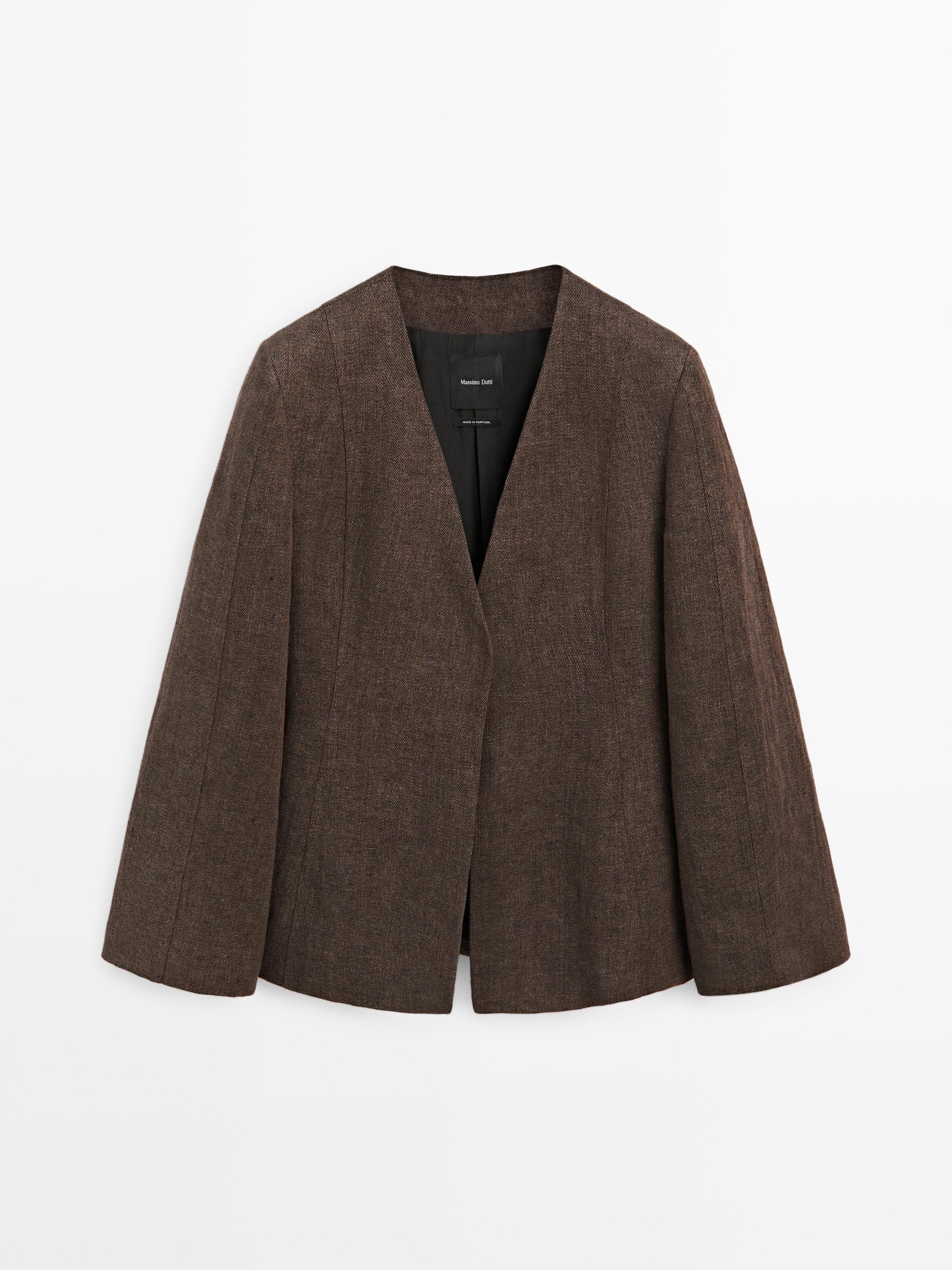 Front view of a brown blazer without lapels, straight cut, and visible seams.