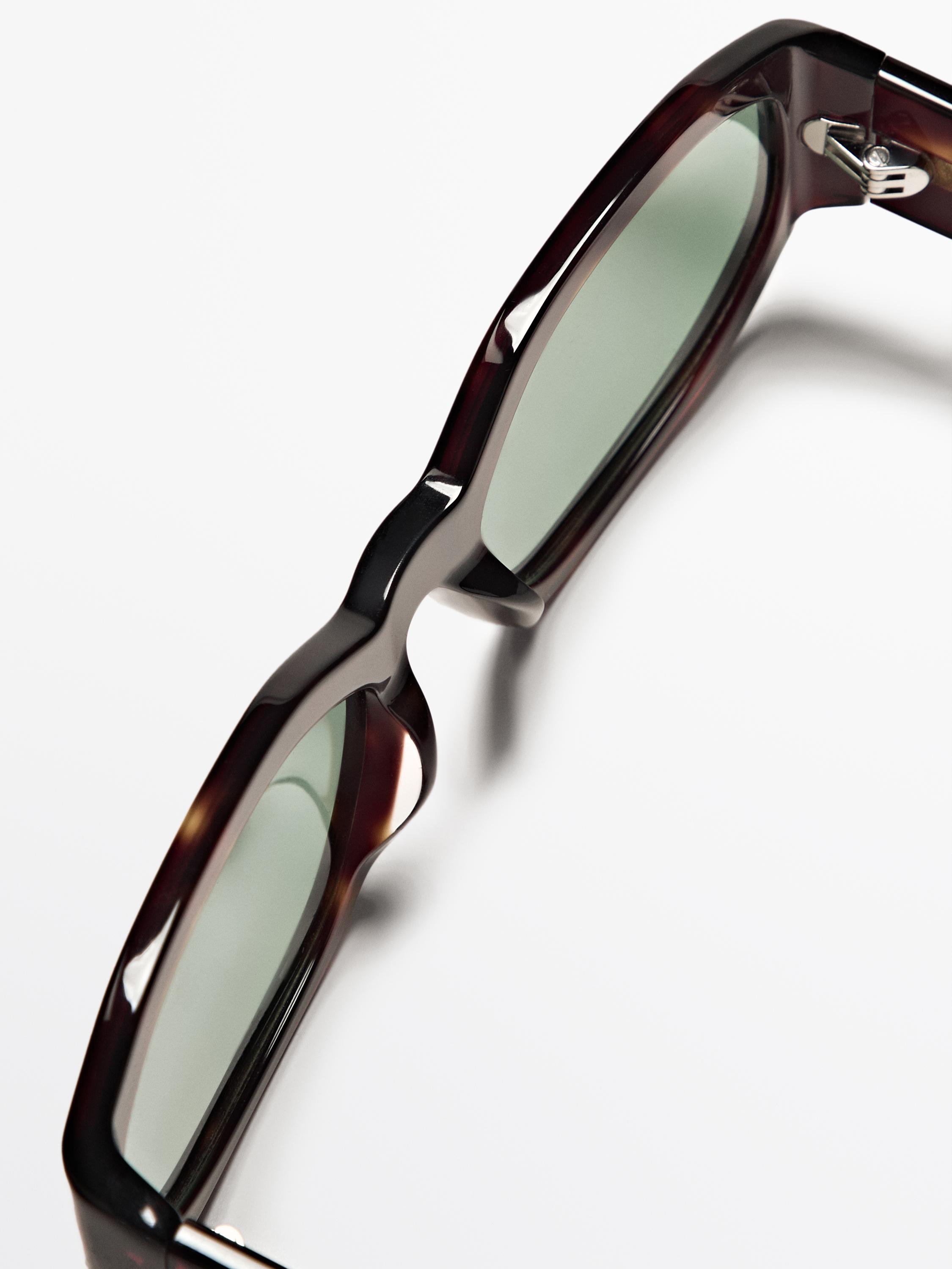 Small elongated sunglasses