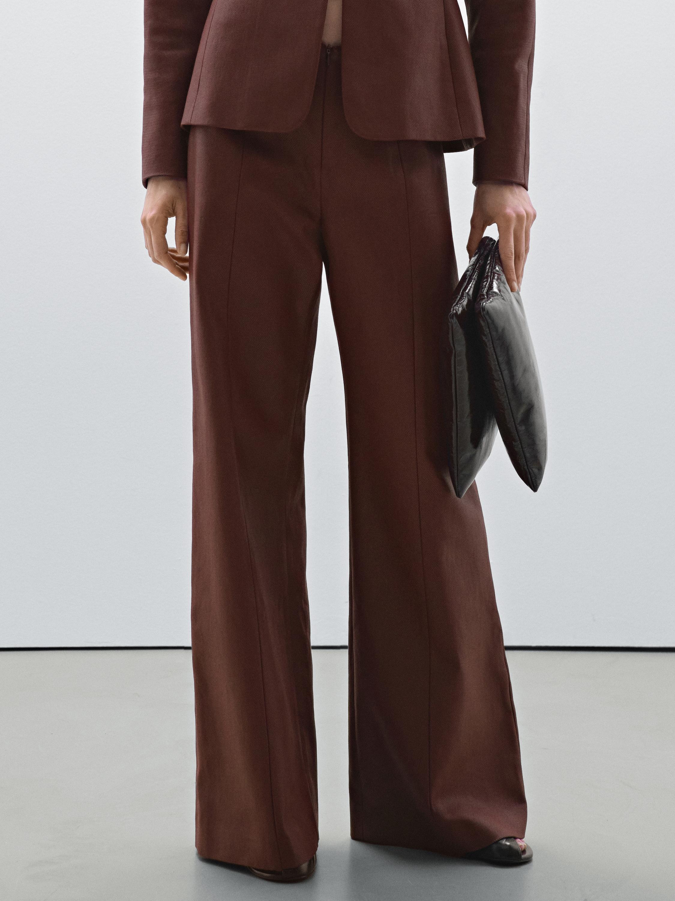 Wide-leg trousers with seam details - Studio