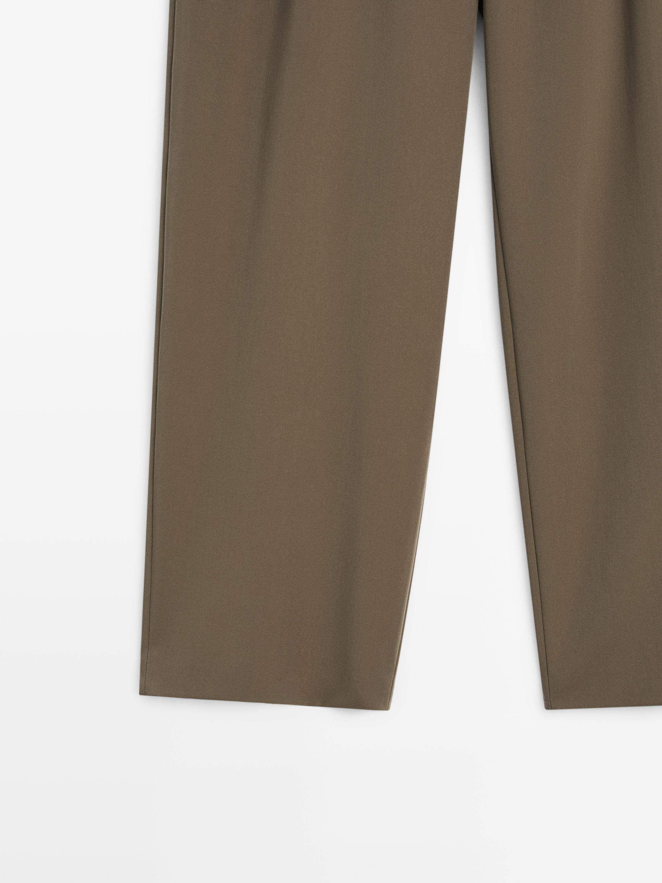 Wide-leg flowing trousers with darts