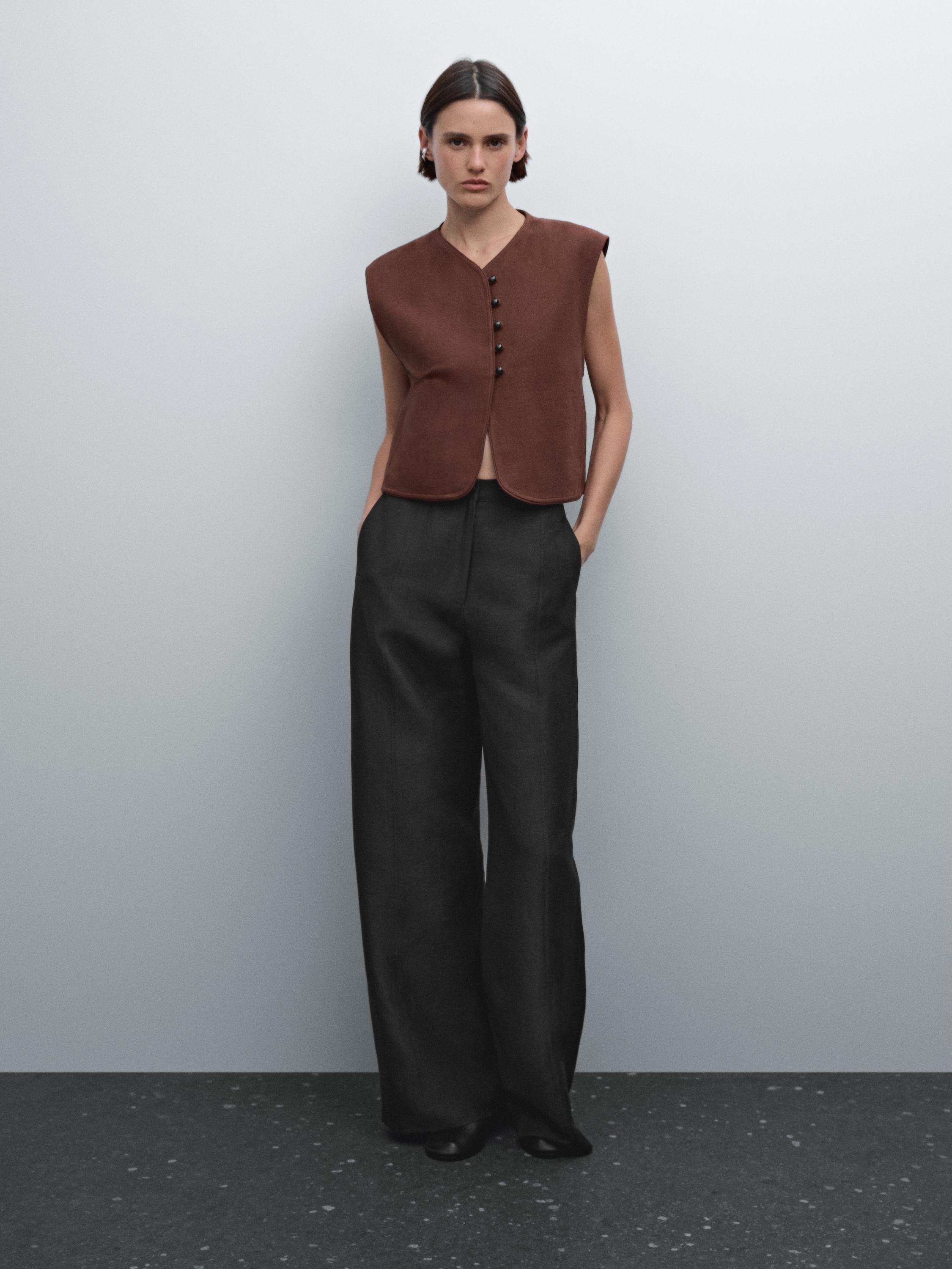 Flowing wide-leg trousers with seam details