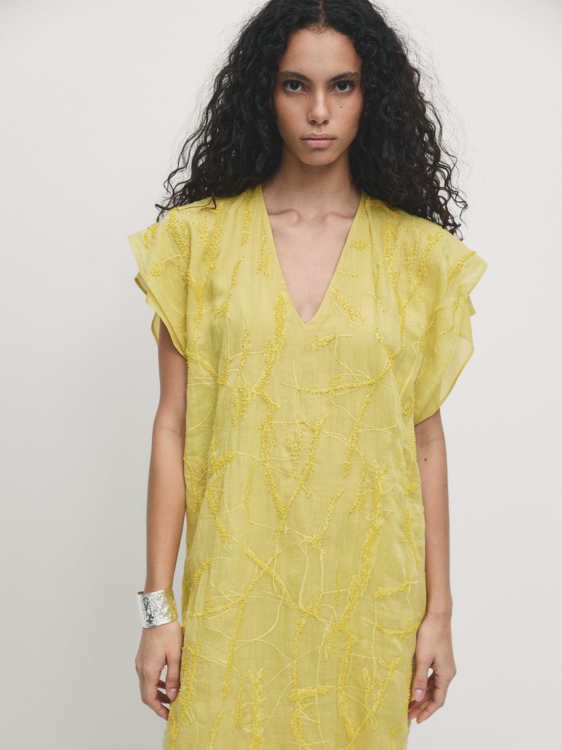 Robe à col en&nbsp;V avec broderie