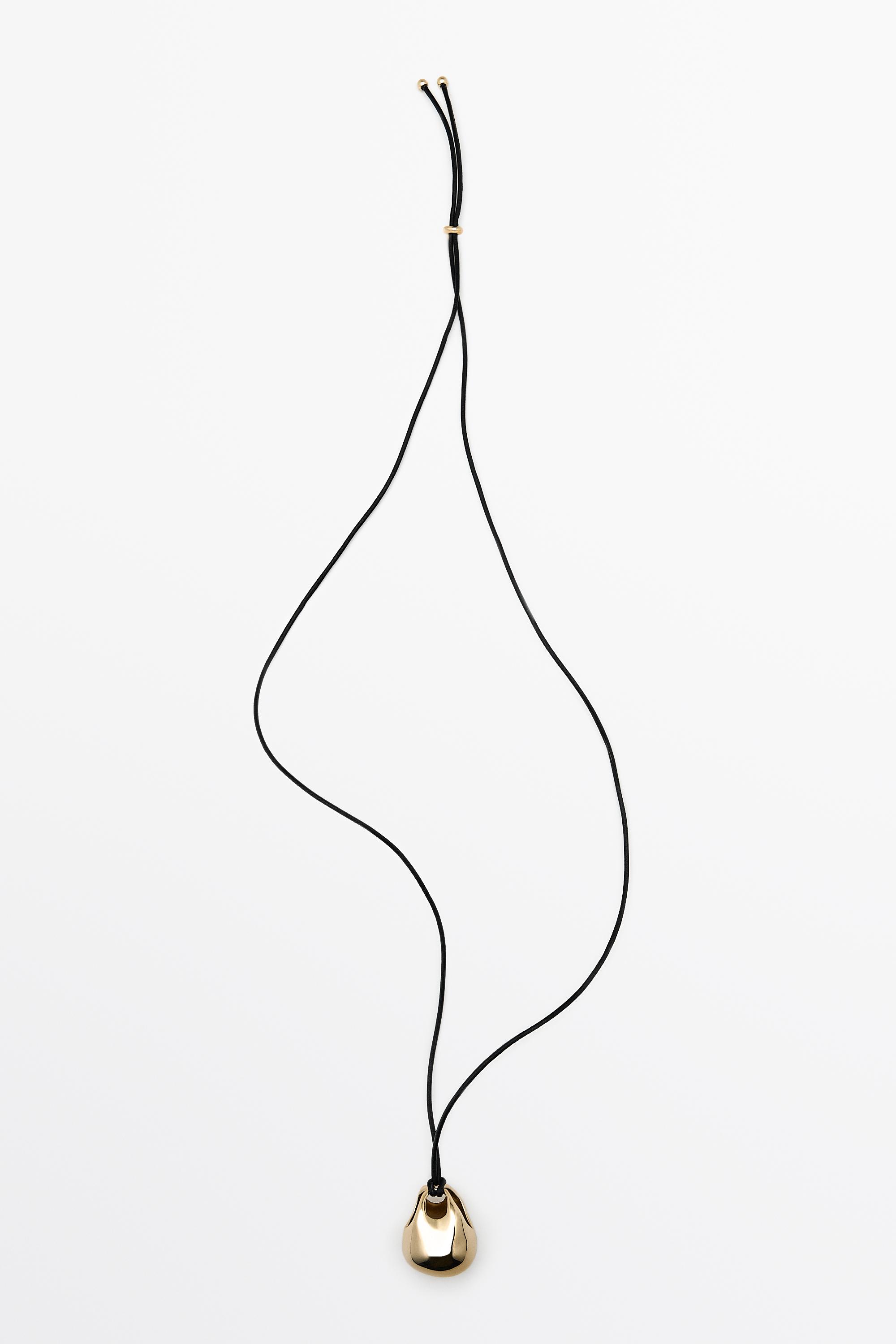Oval bag pendant necklace — GOLDEN