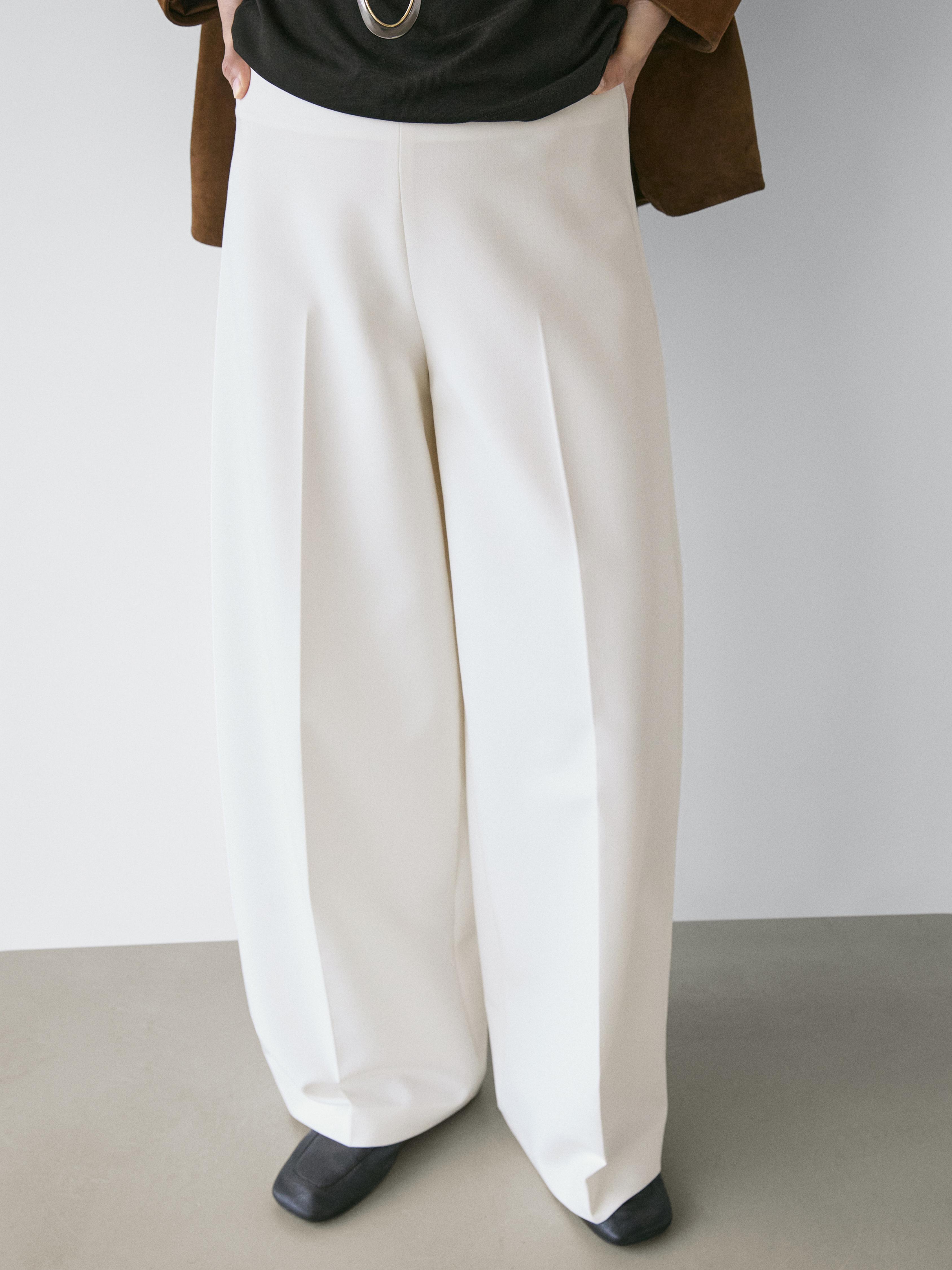 Wide-leg voluminous trousers — CREAM