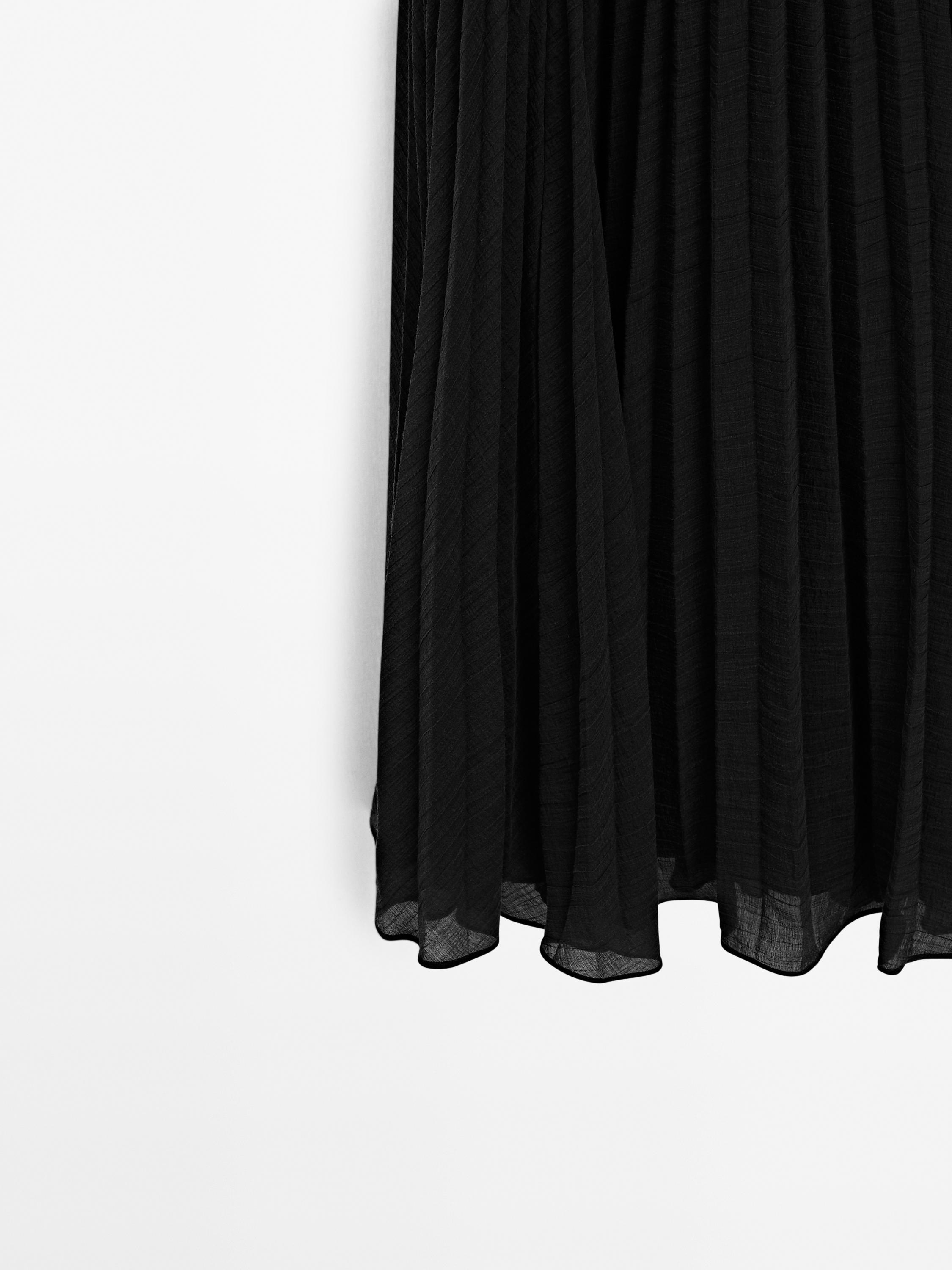 Long pleated dress with waistcoat detail