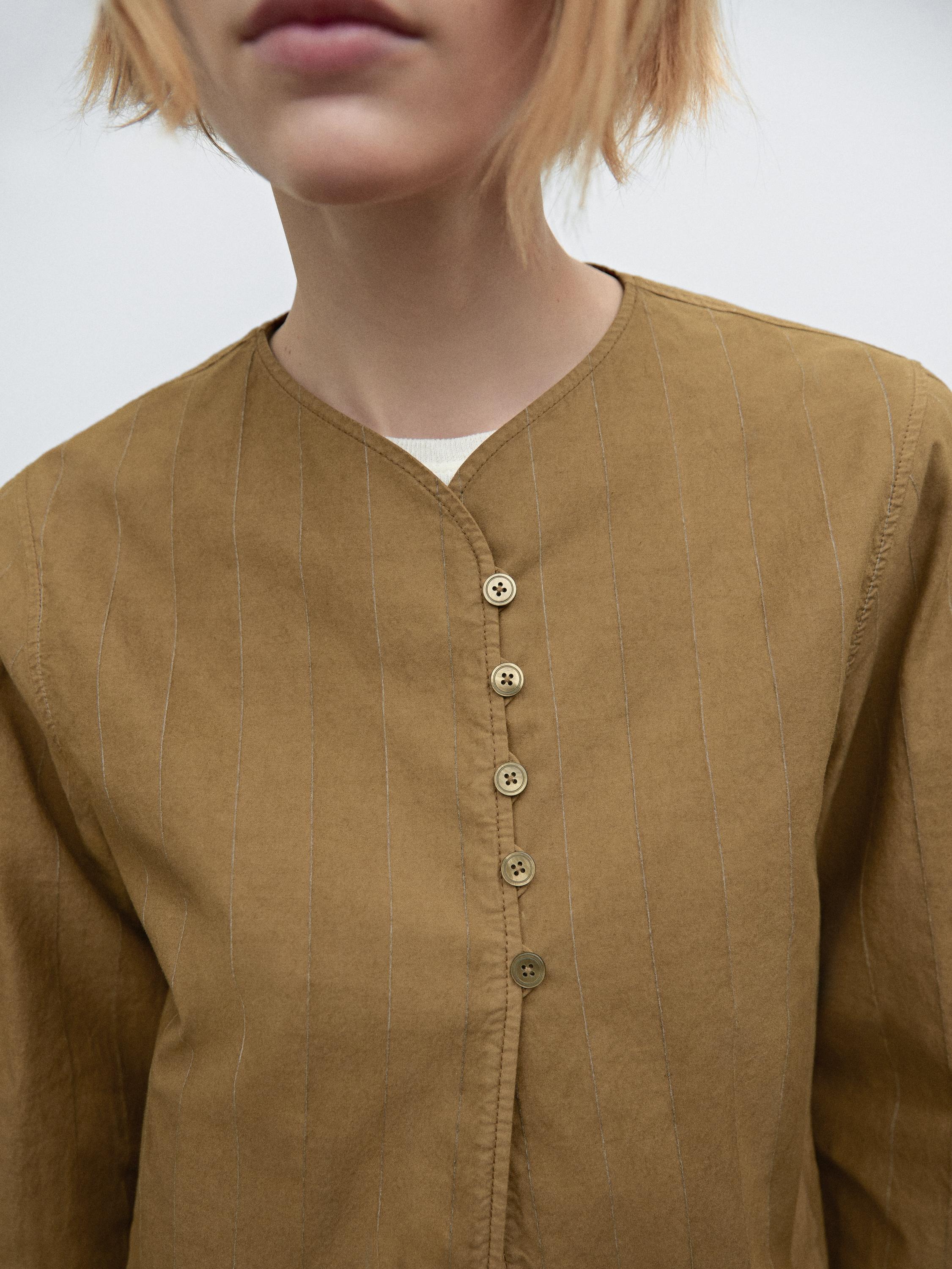 Striped jacket with button detail