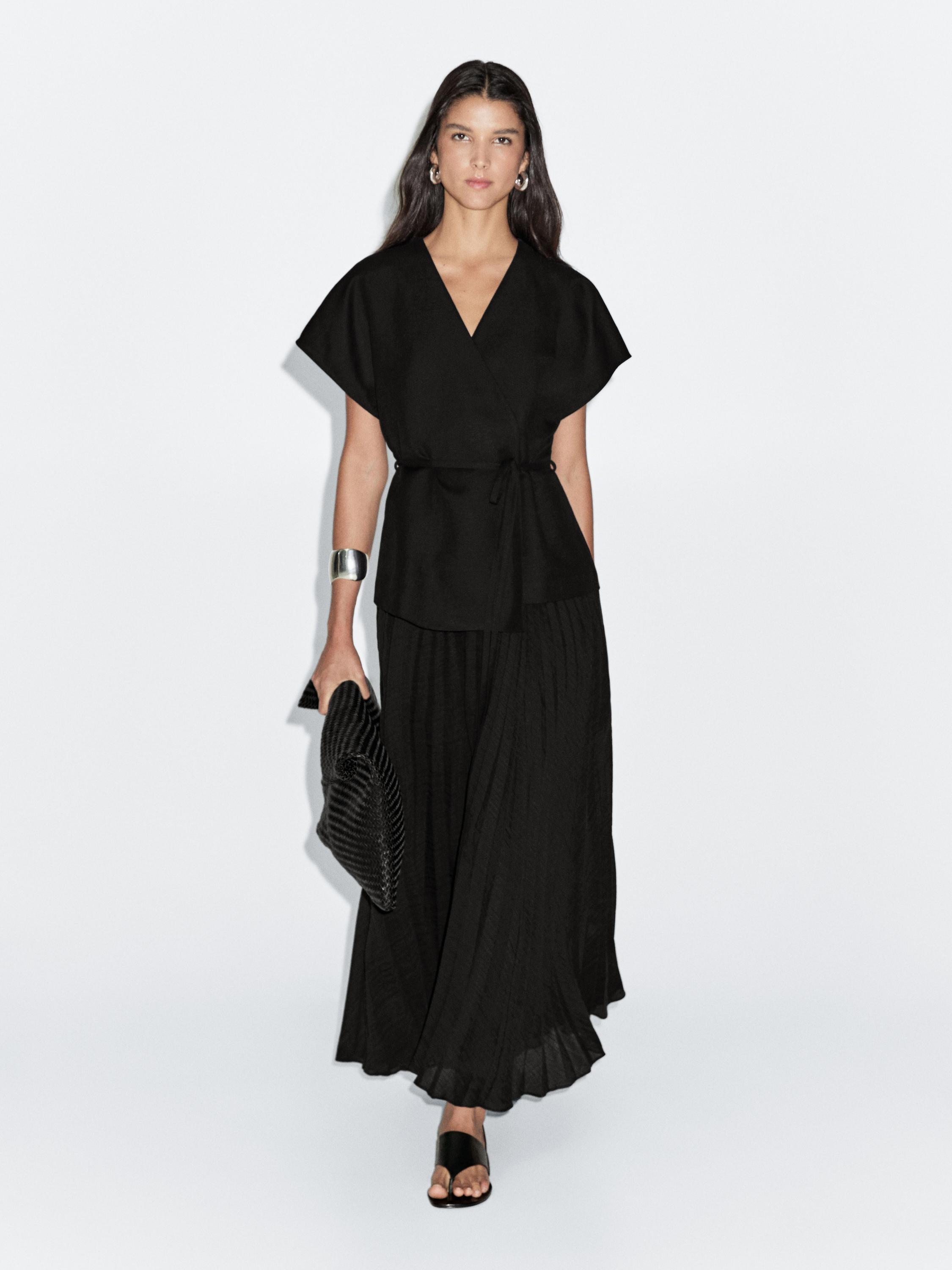 Long pleated dress with waistcoat detail
