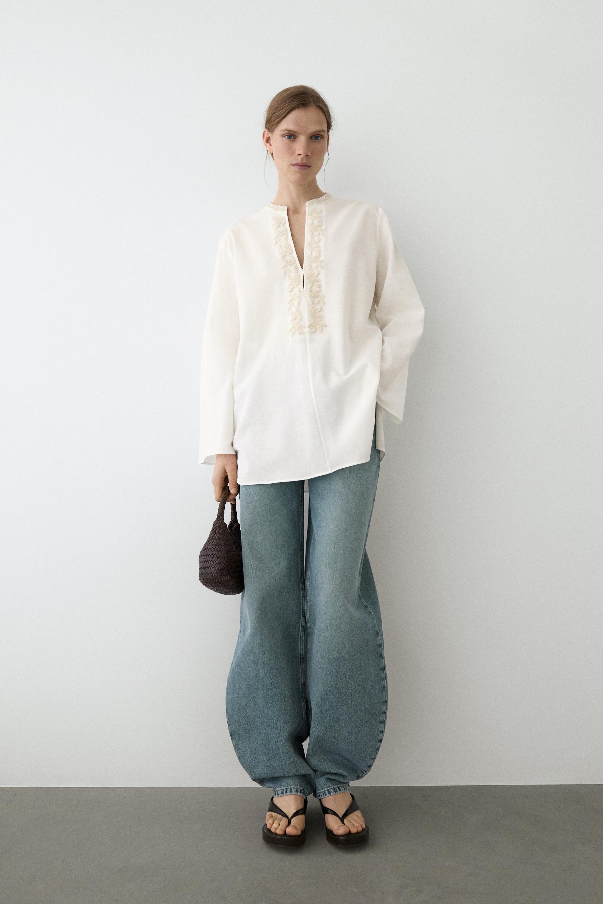 Flowing oversize blouse with stand collar and embroidery — CREAM