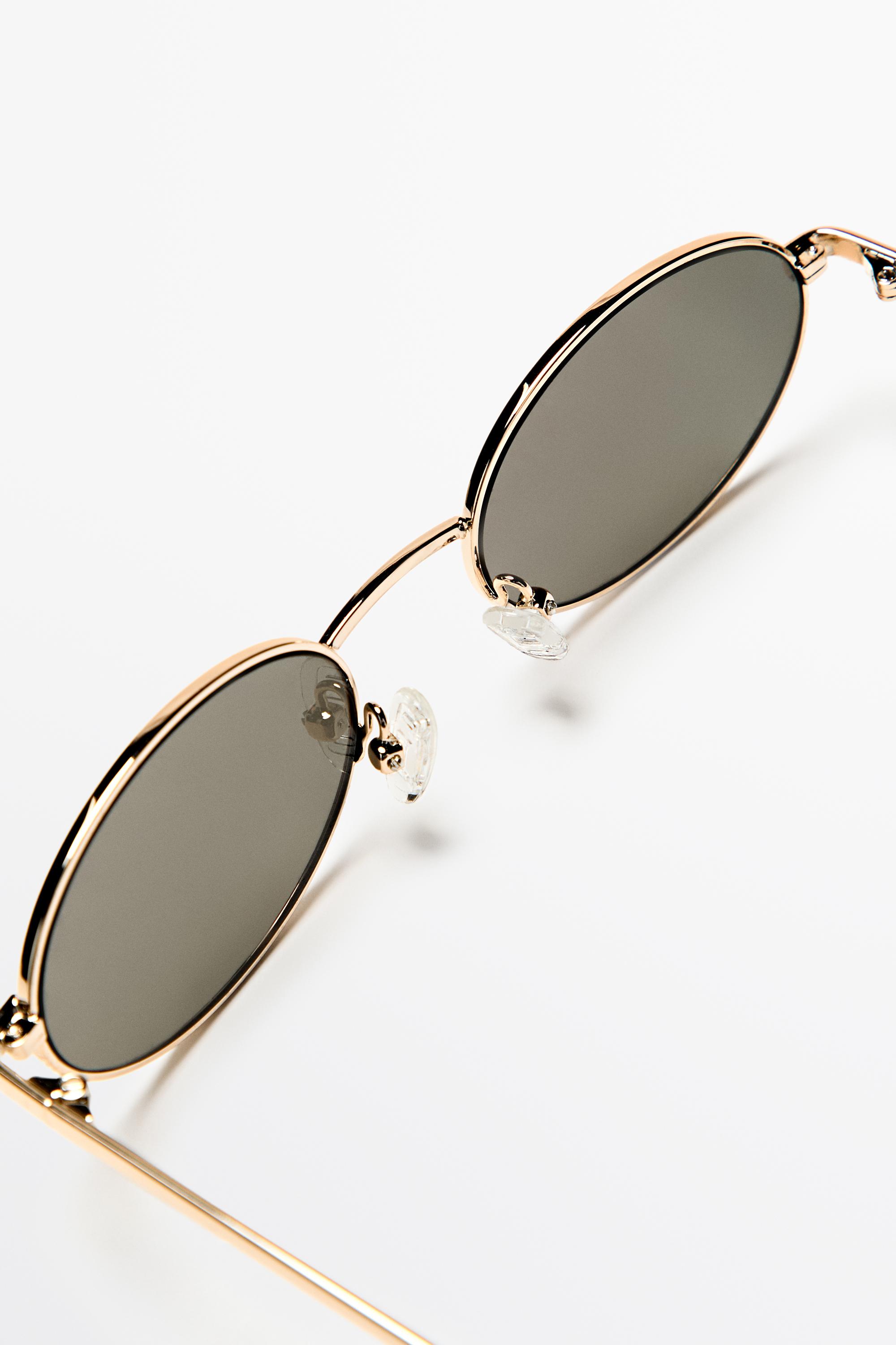 Oval metal sunglasses — GOLDEN