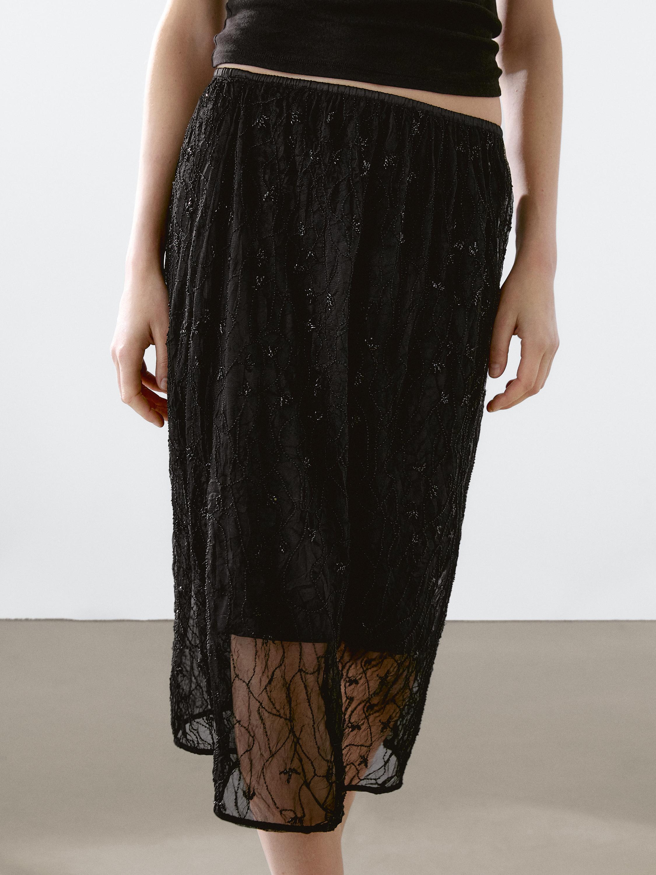 Halbtransparenter Midirock mit Strass