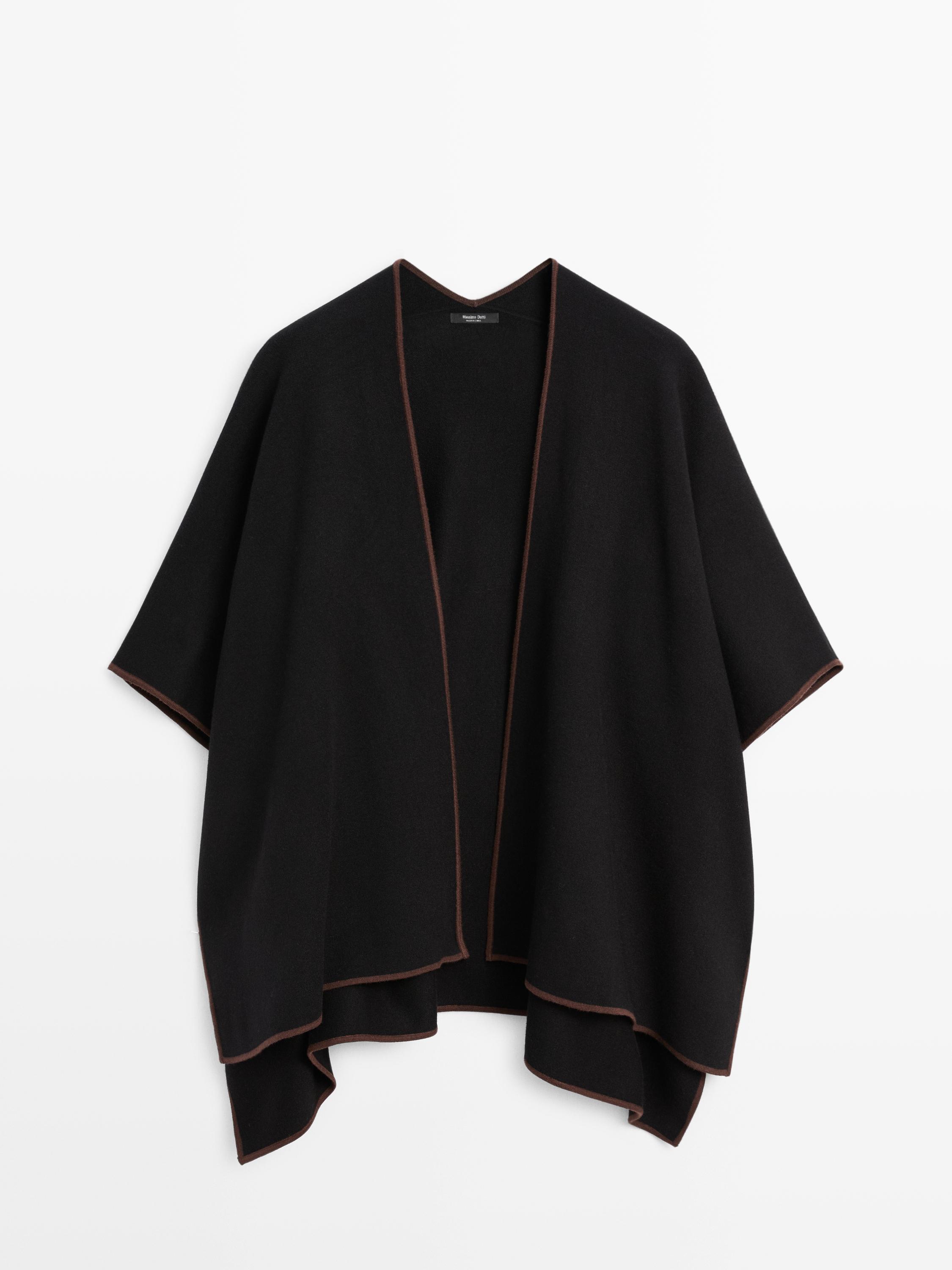 Knit cape with contrast detail