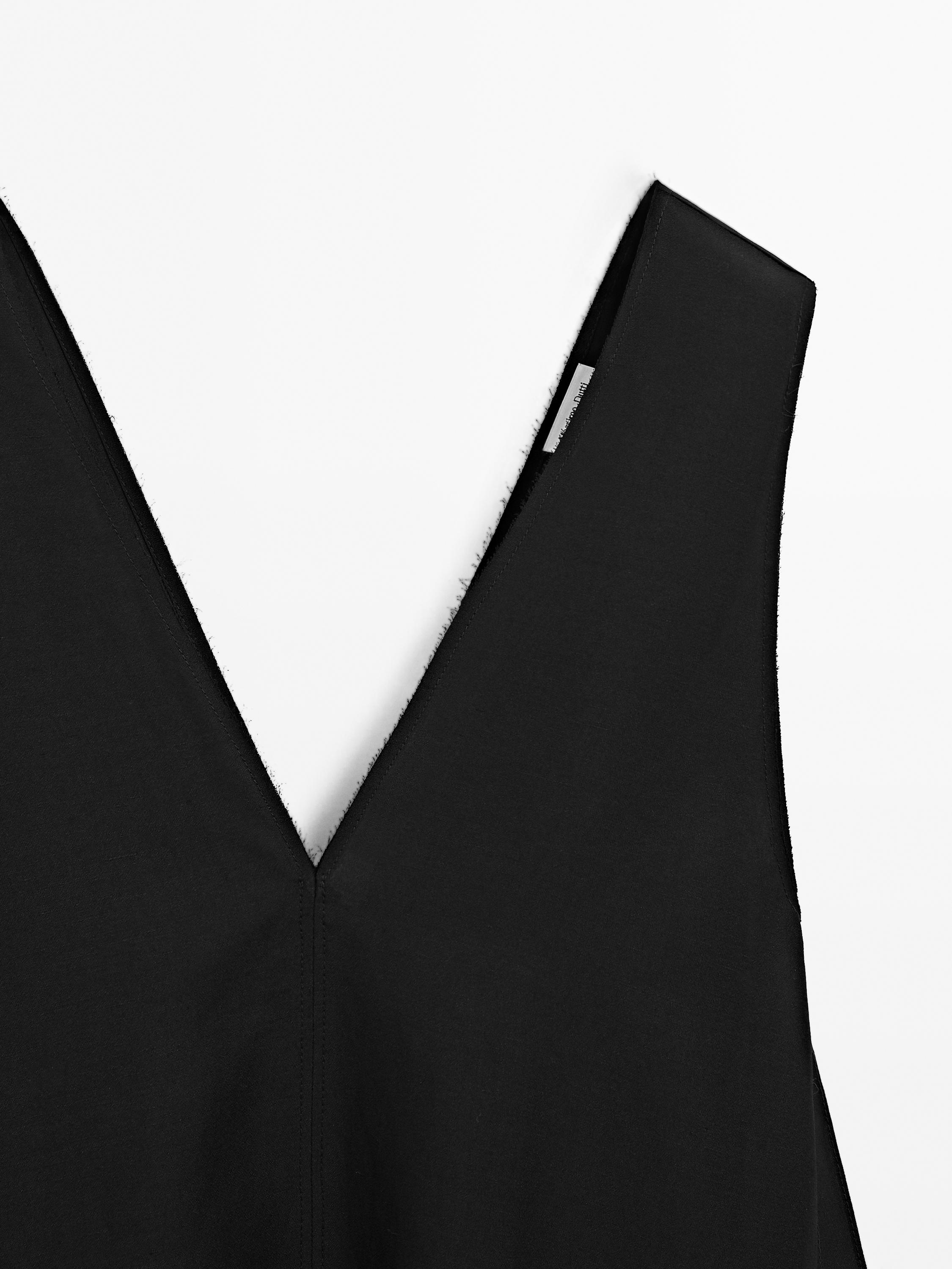 Langes Kleid mit rundem Saum - Limited Edition
