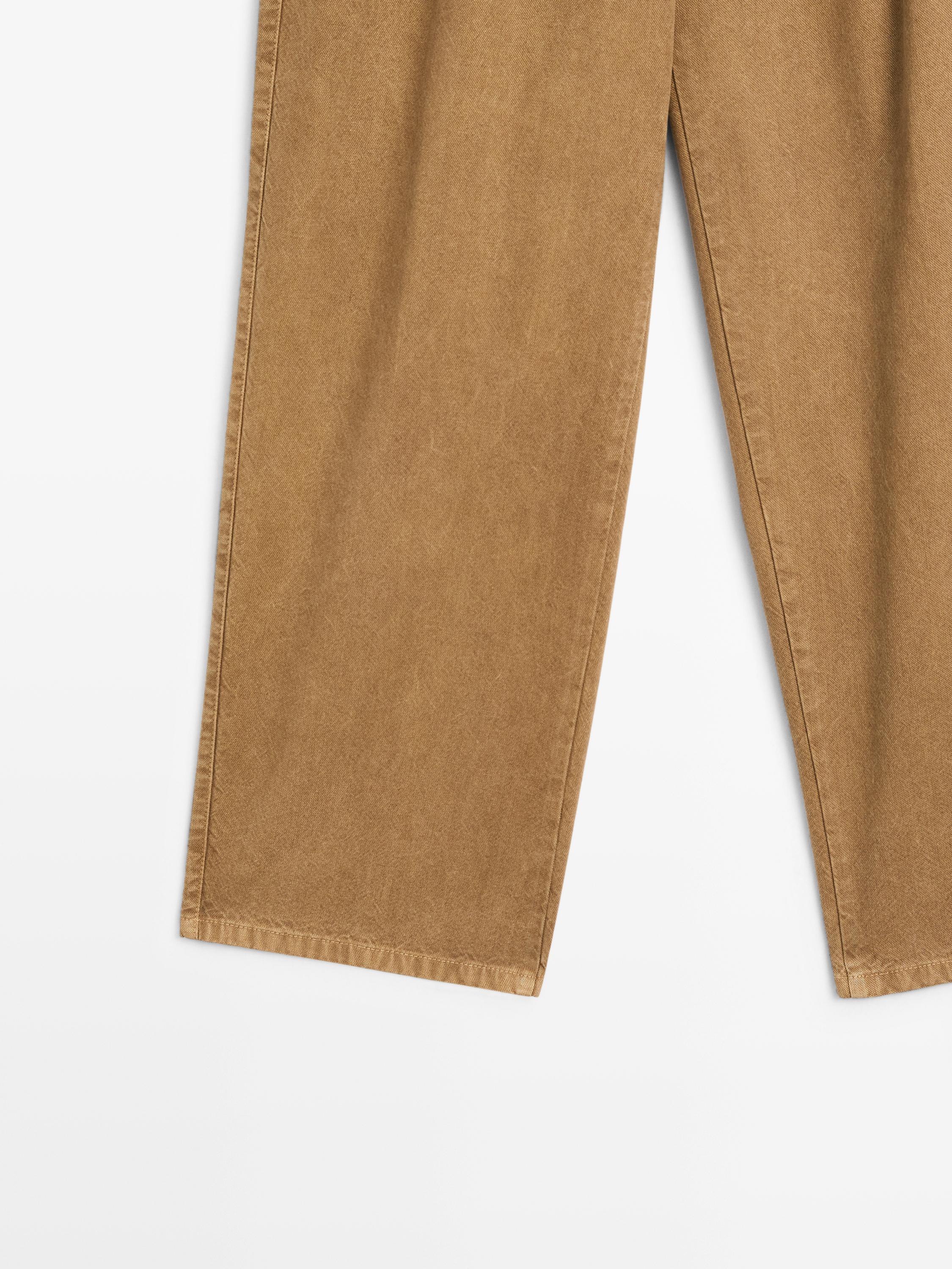 Pantalón relaxed fit tiro alto
