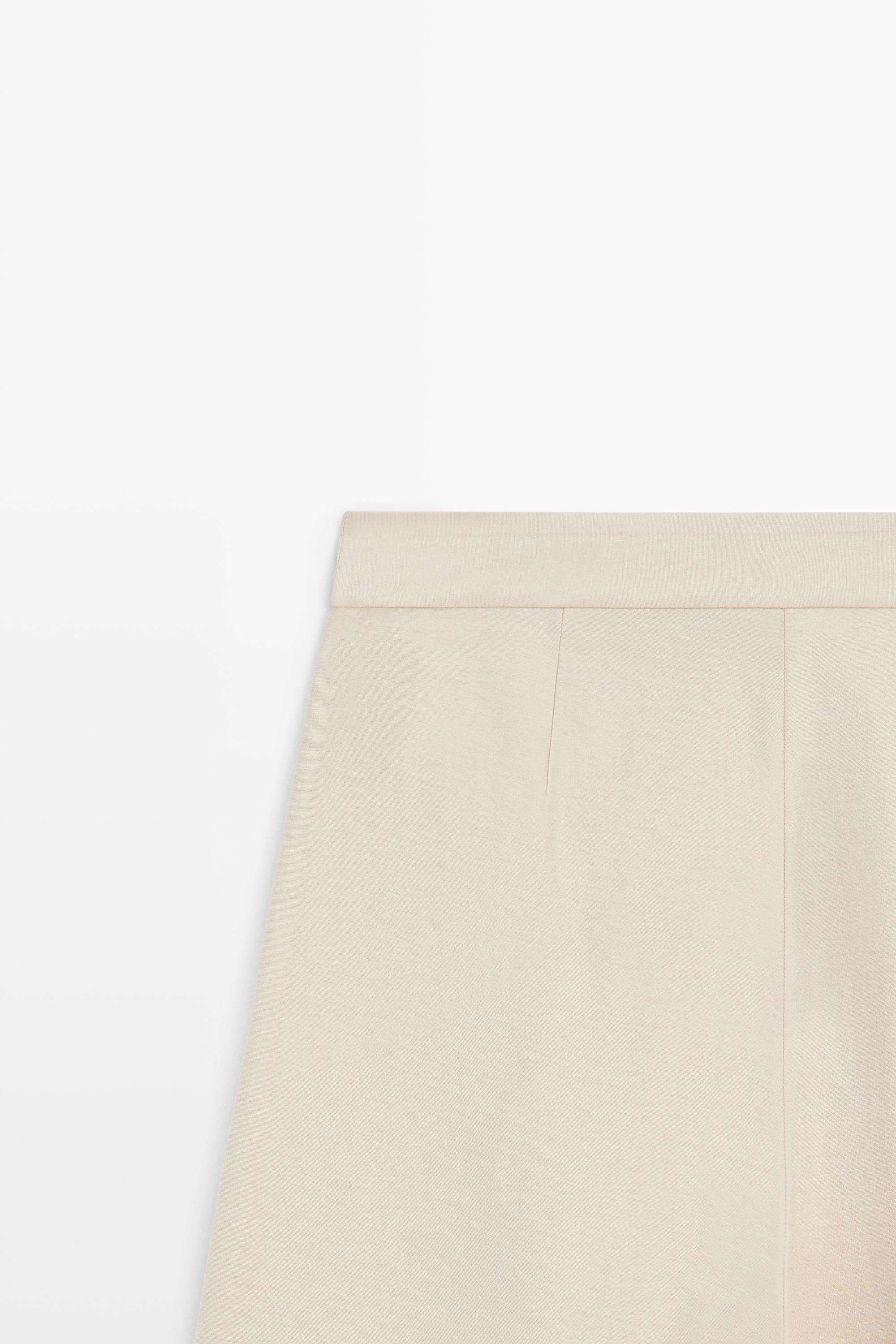 Flowing pleated Bermuda shorts - STUDIO — STONE
