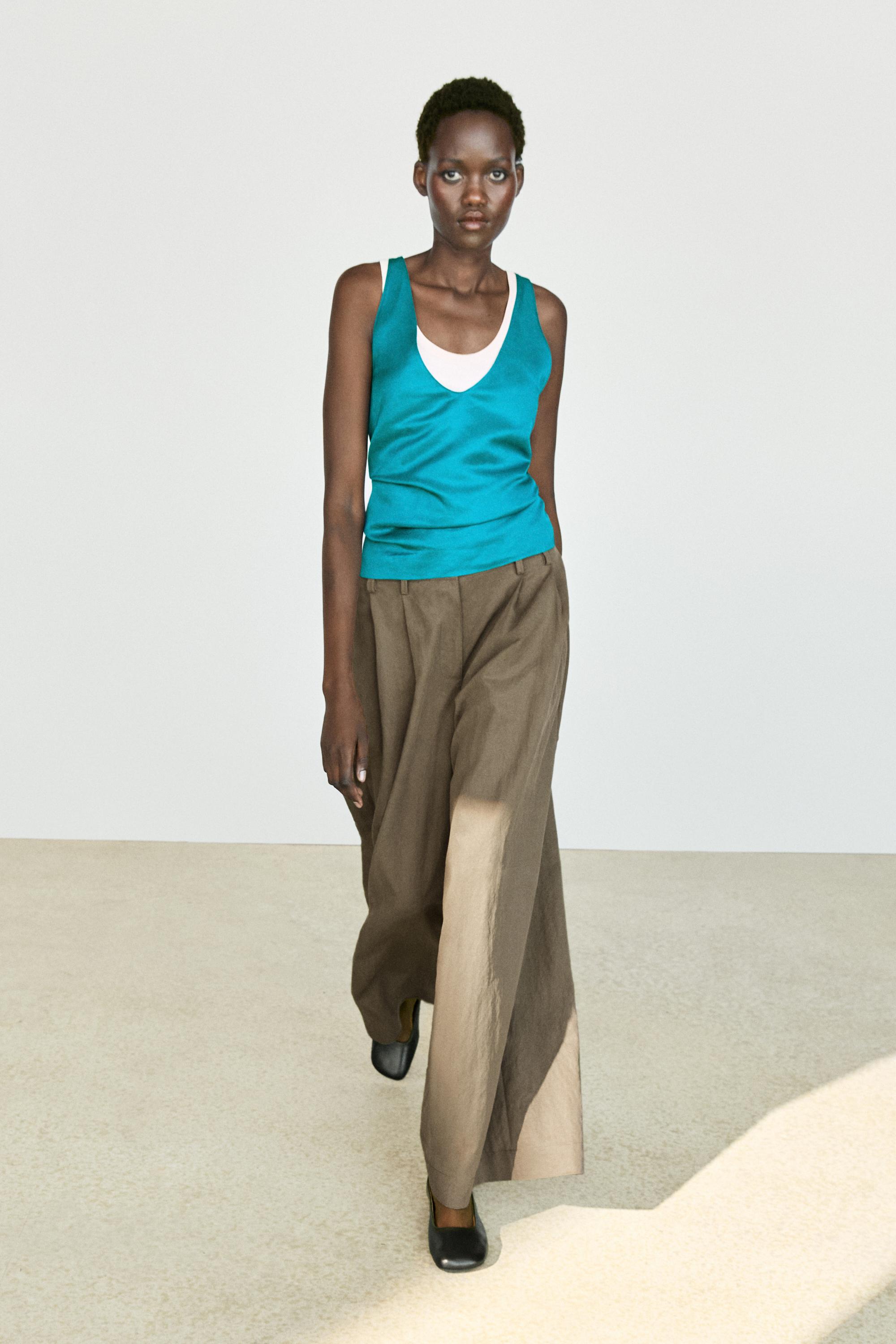 Pantalón fluído pregos ancho técnico