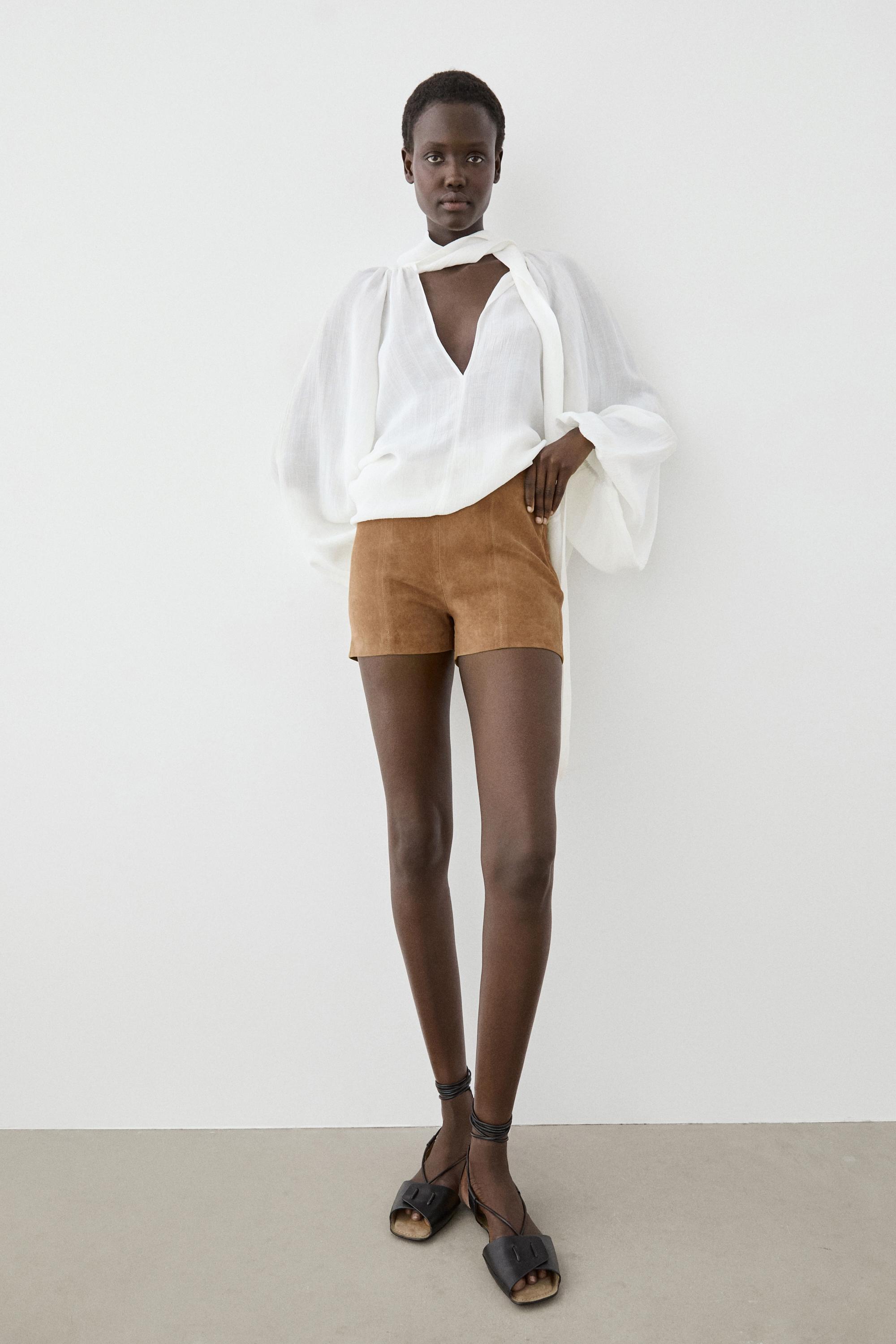 Suede leather shorts with seam details — CAMEL