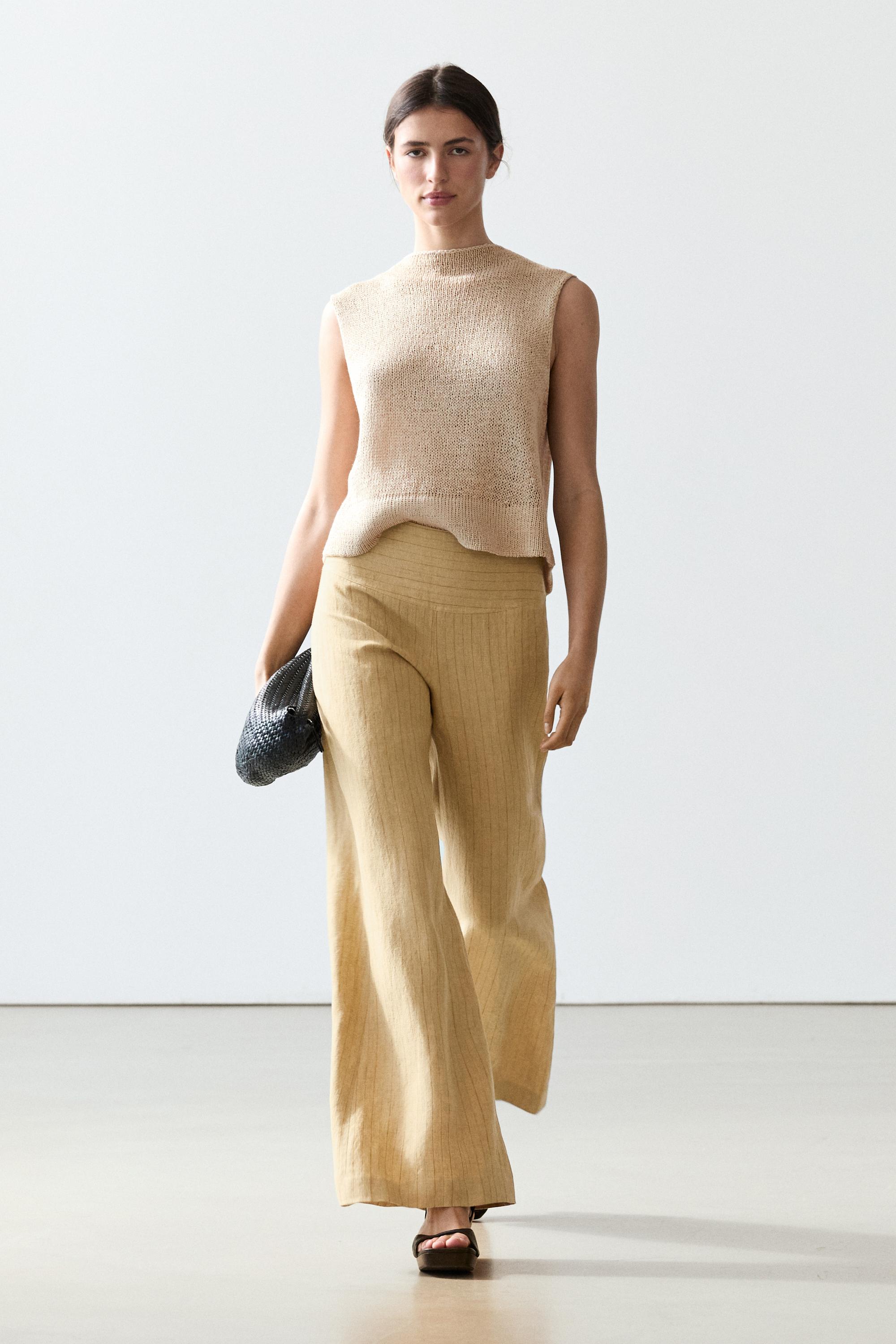 Flare fit linen trousers with striped details