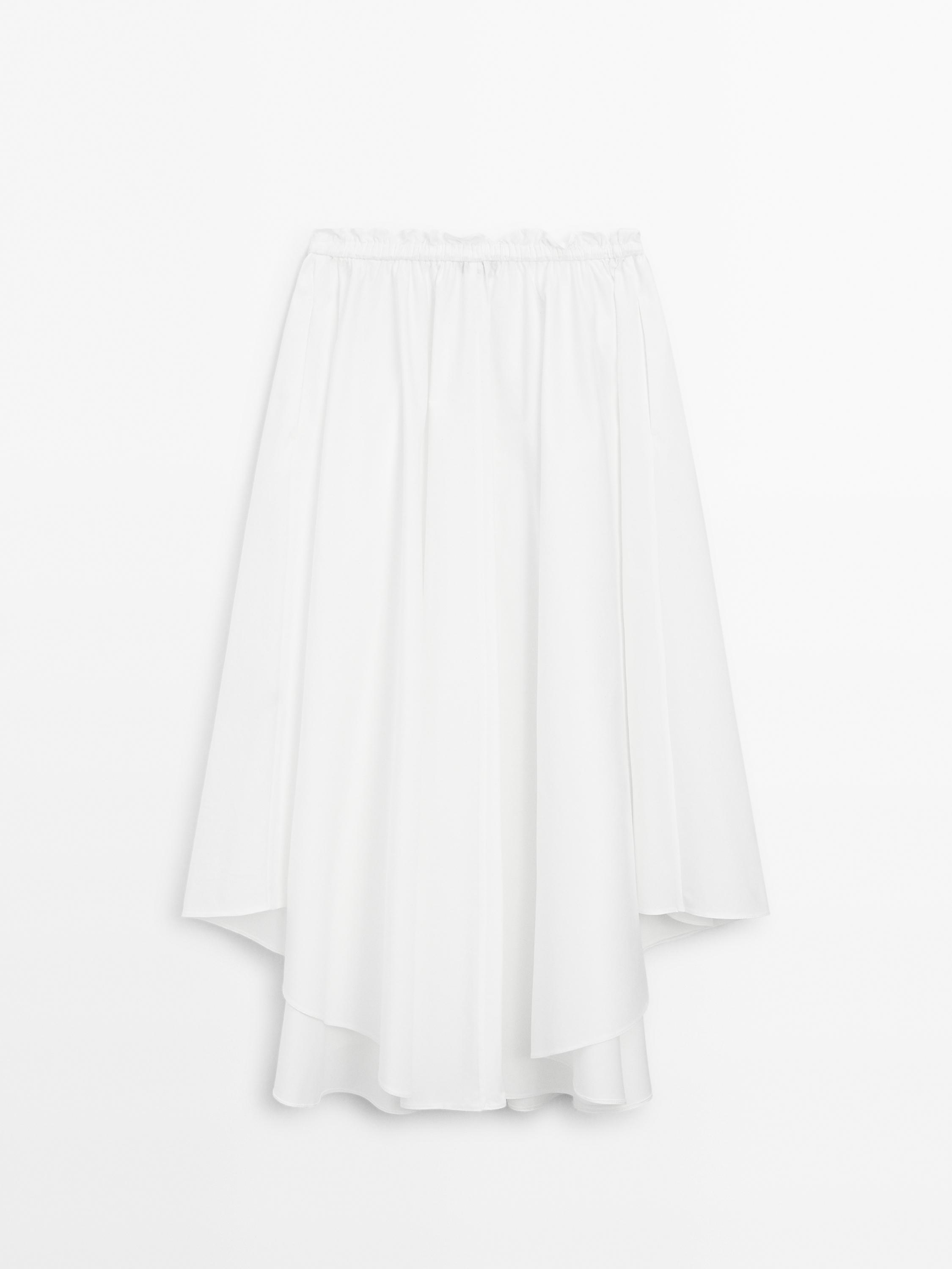 Luźna asymetryczna spódnica średniej długości