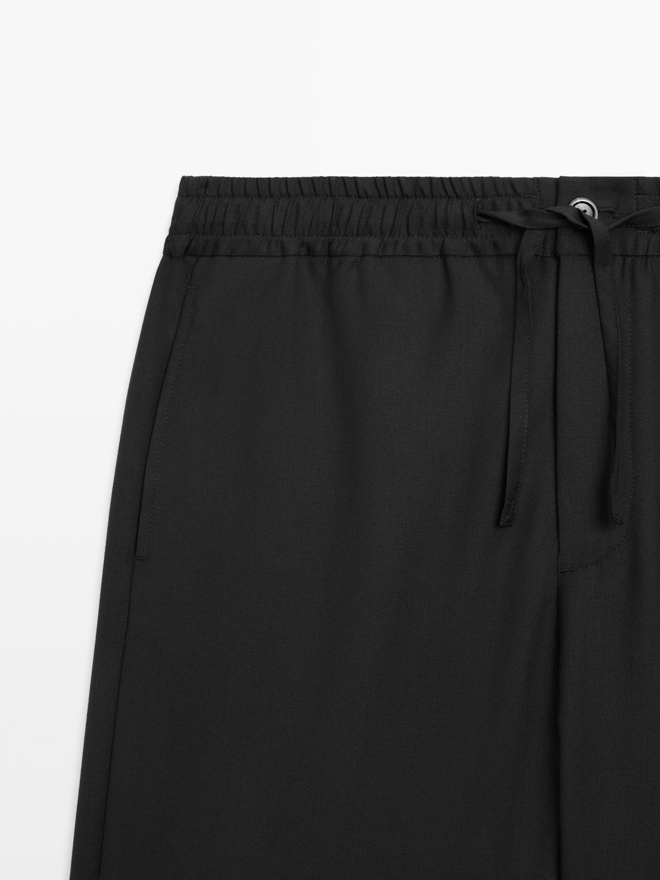 Relaxed fit 100% wool trousers — BLACK