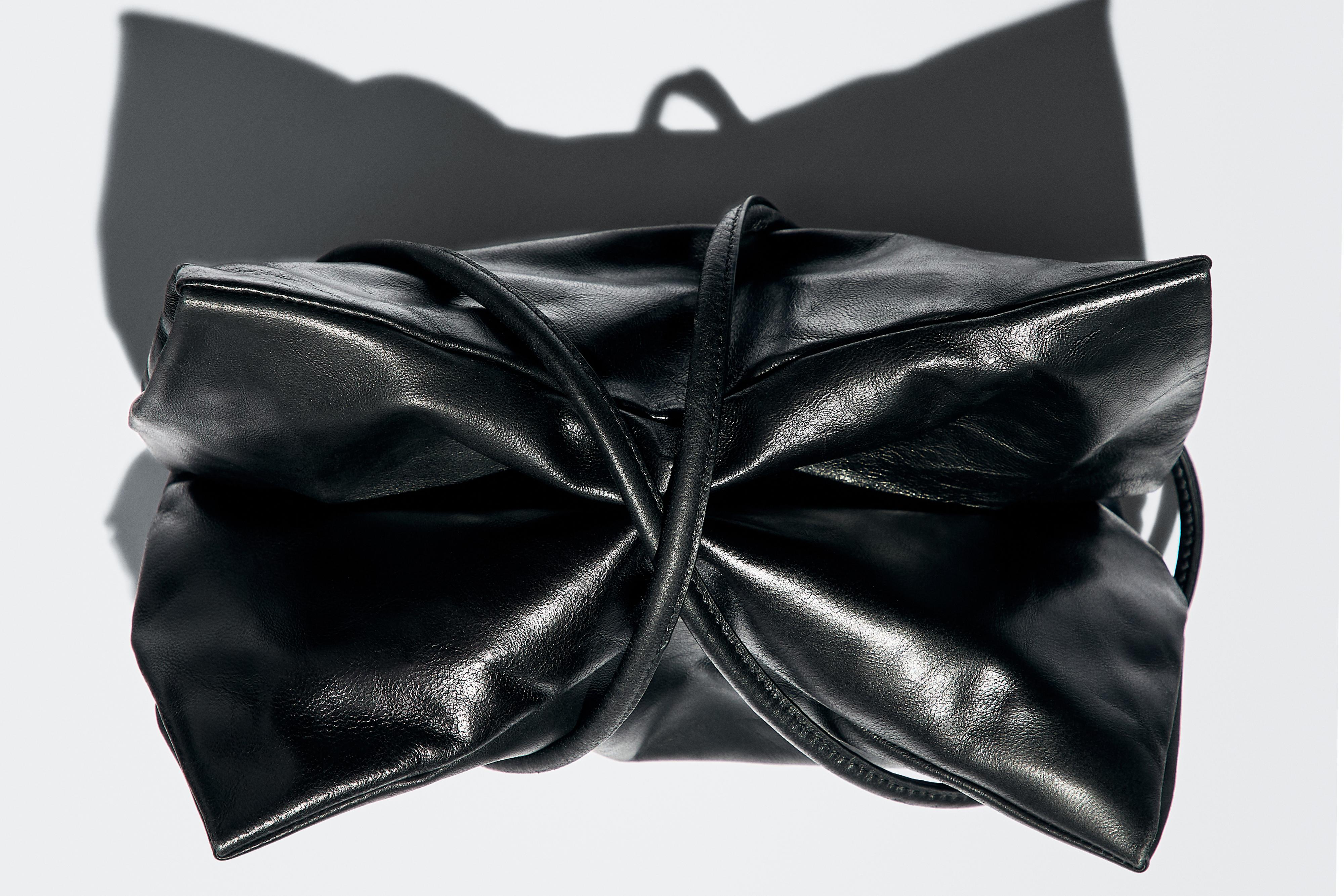 Small nappa leather bag with compartments