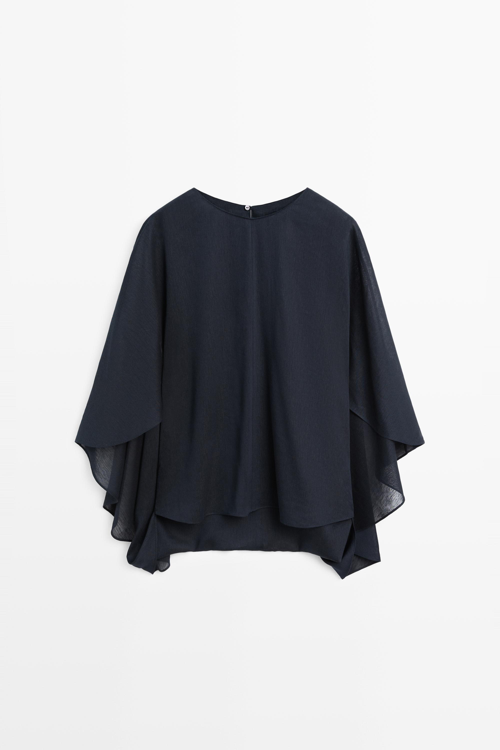 Asymmetric flowing cape