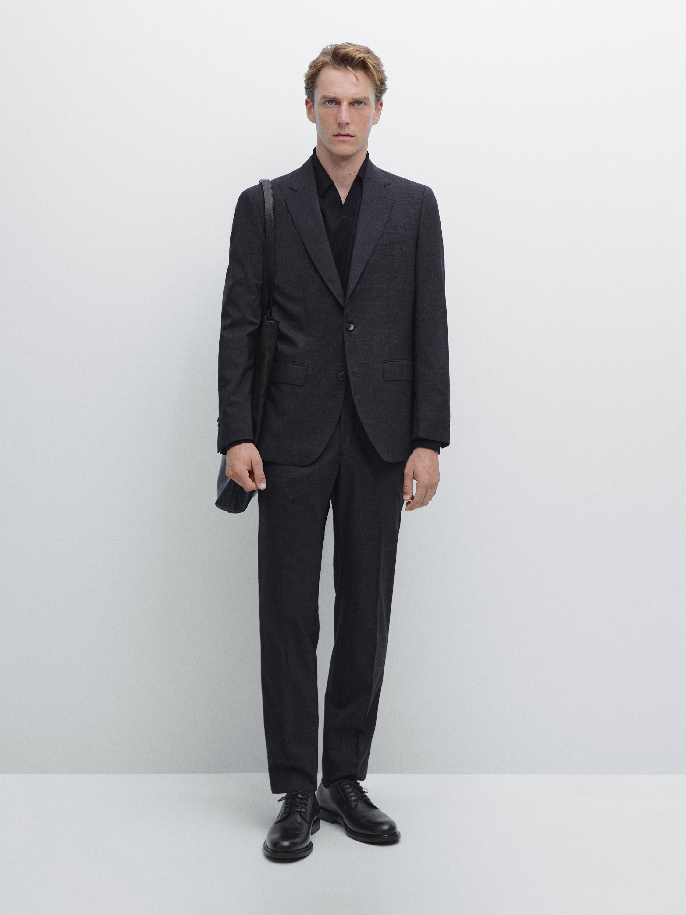 Kariraste hlače iz 100 % volne